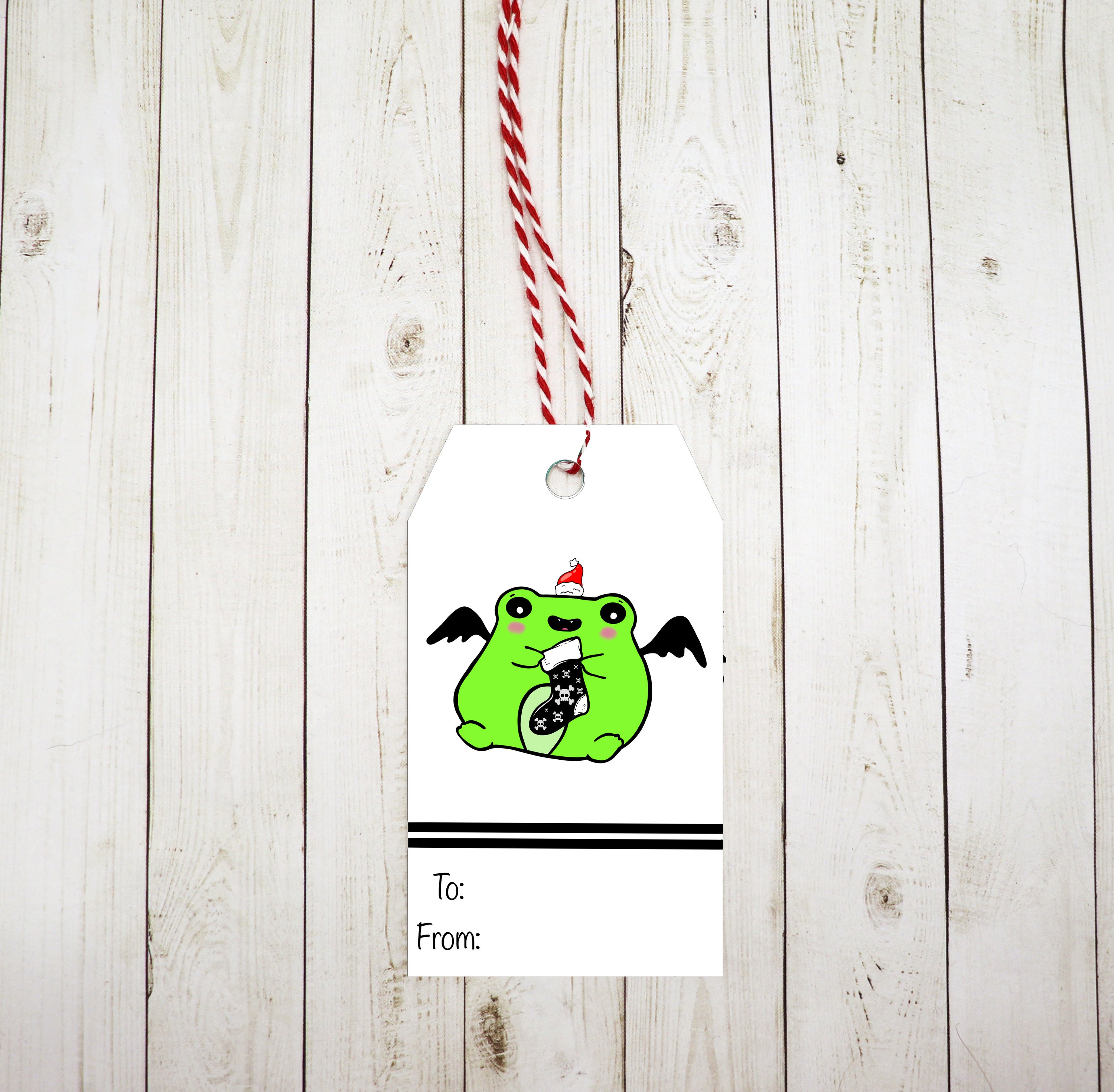 A set of 8 Goth Frog Gift Tags featuring a whimsical design, printed on heavy white cardstock with red and white twine included.