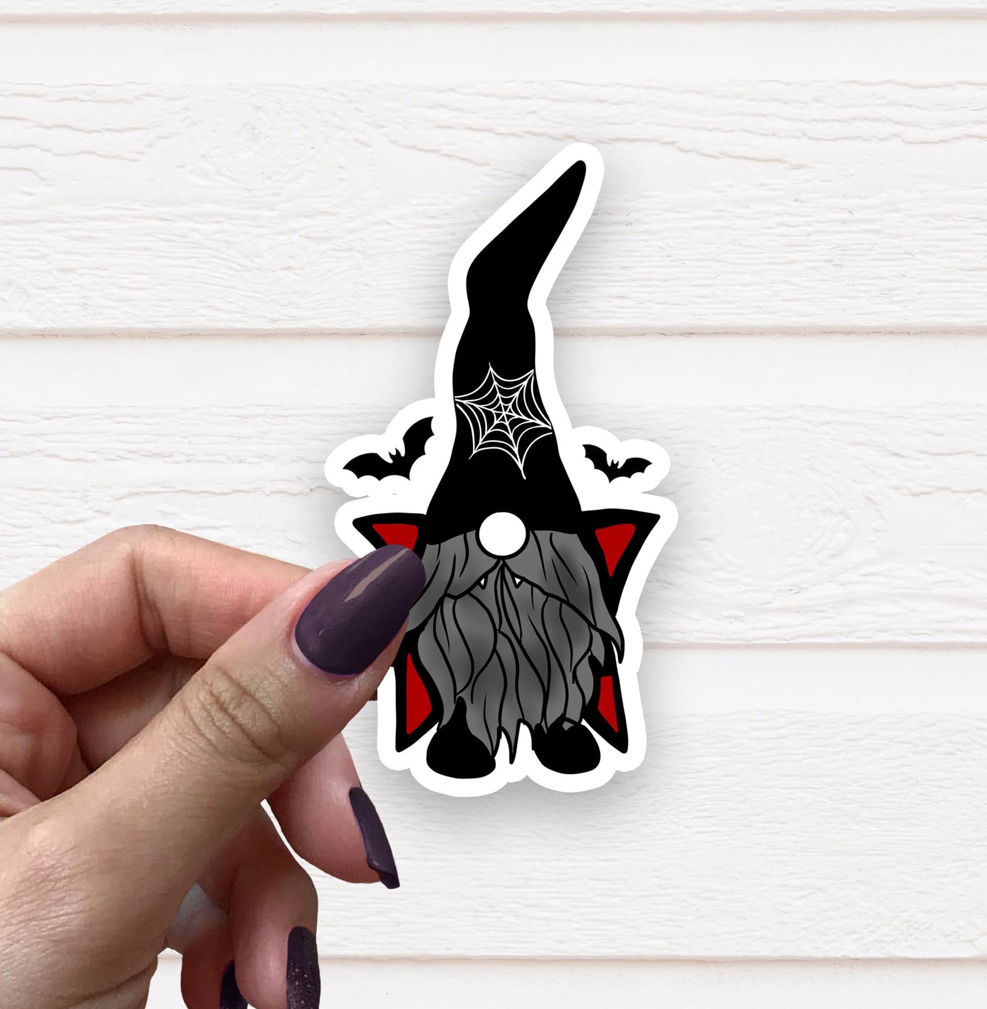 A vibrant Goth Gnome Vinyl Sticker featuring a whimsical gnome design, perfect for personalizing various items.