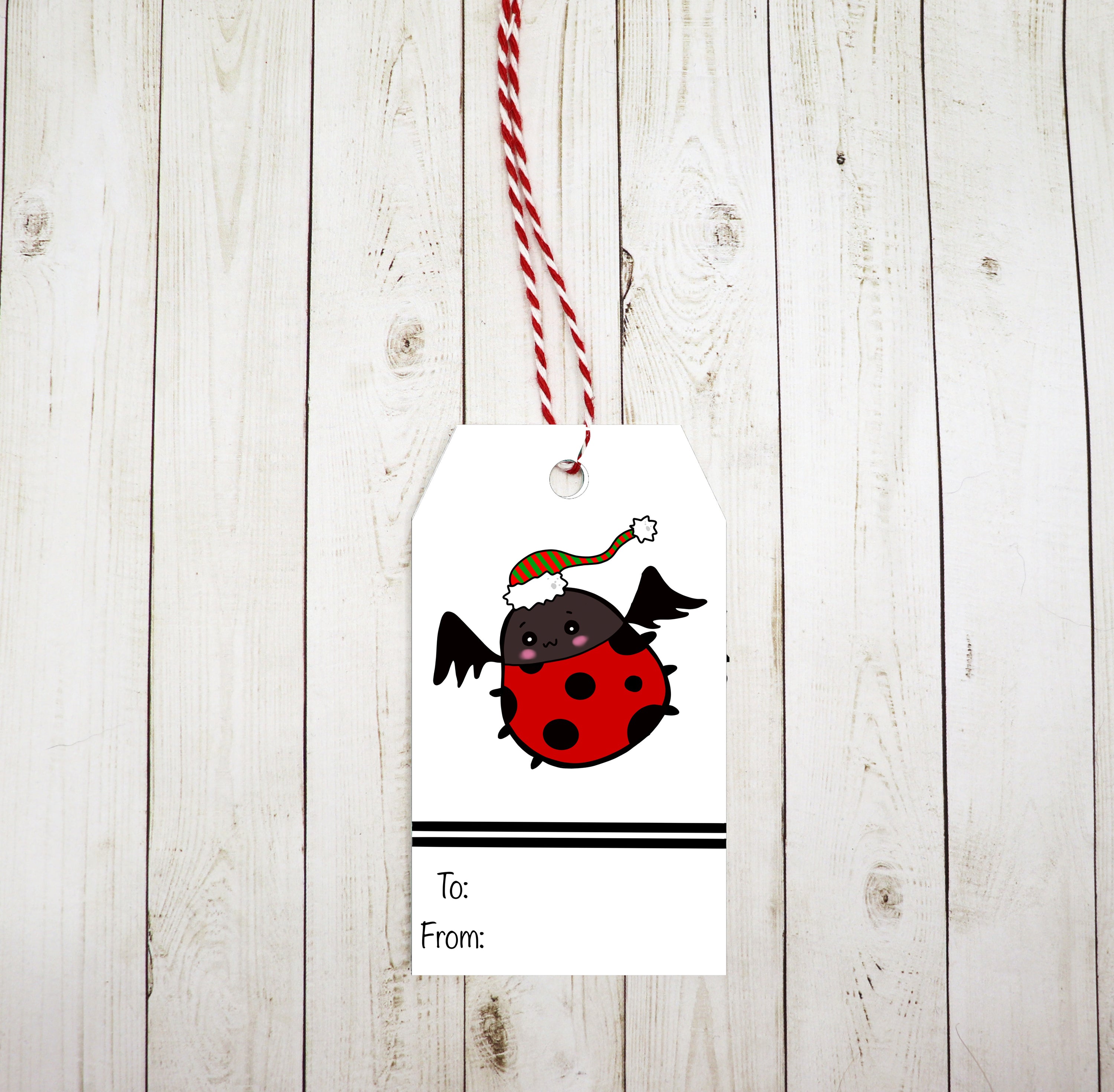 Goth Ladybug Gift Tag featuring a cute ladybug design on heavy white cardstock, with red and white twine for easy attachment.