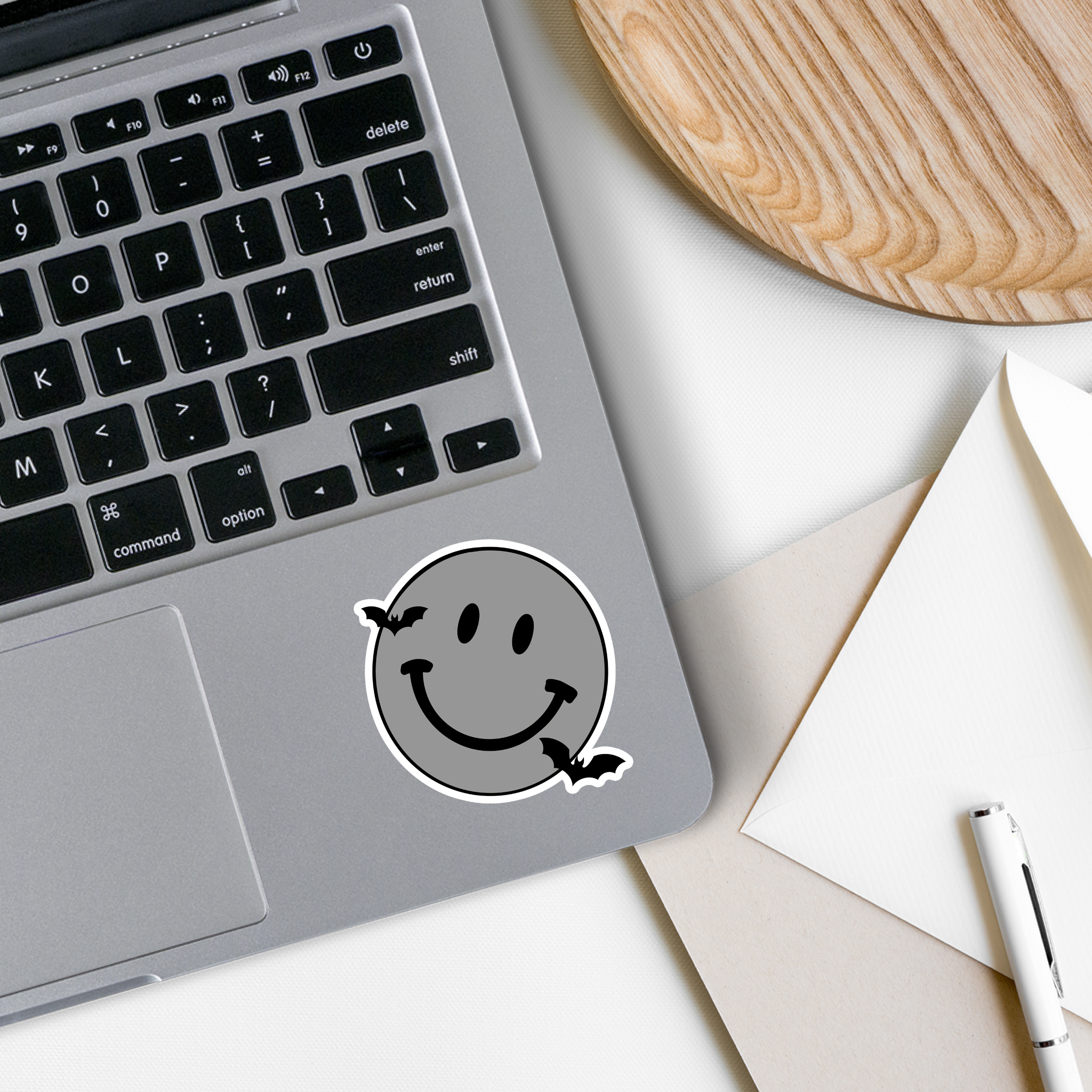 Gothic Smiley Face Vinyl Sticker on a white background, showcasing its unique design and matte finish.