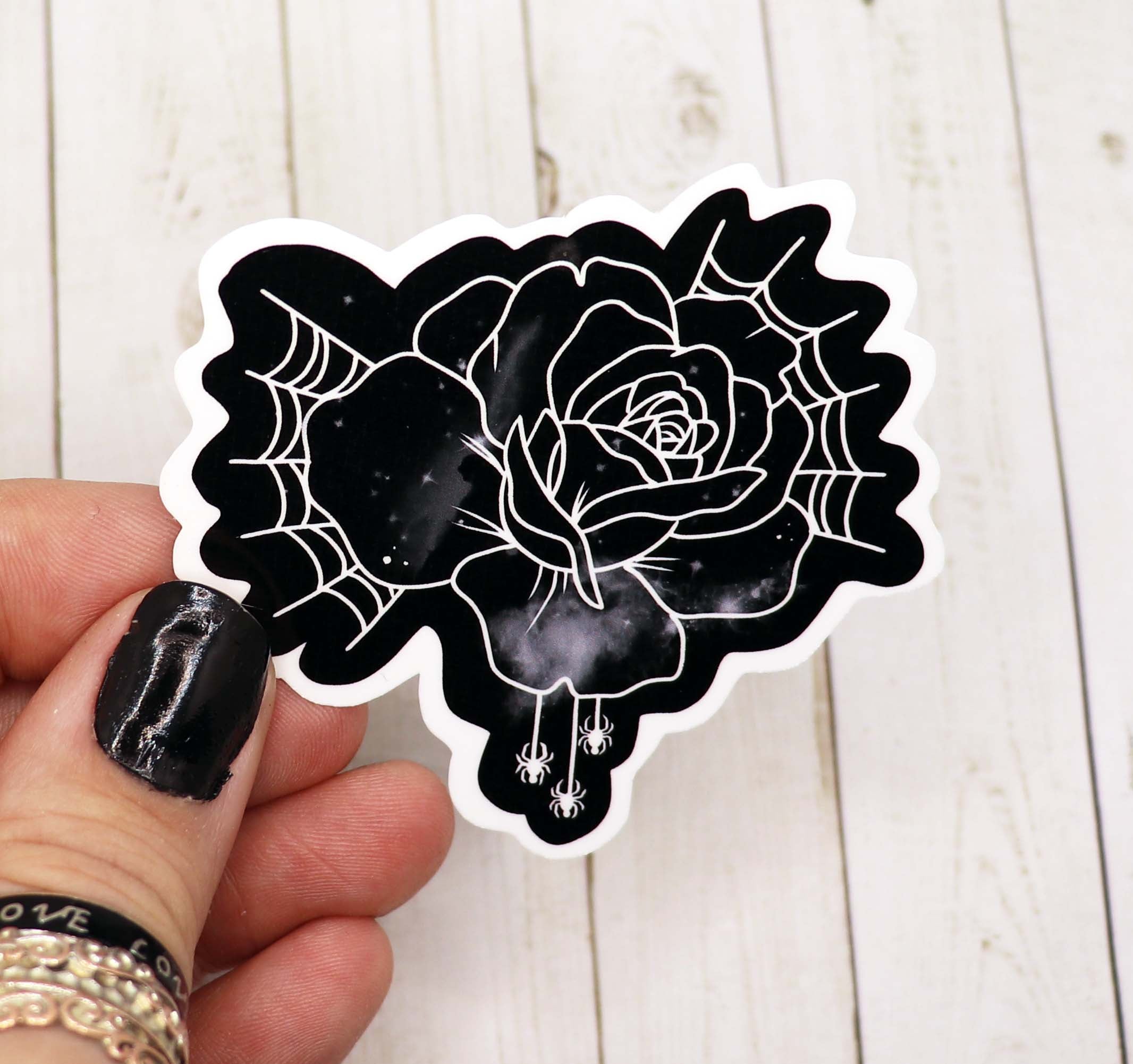 Gothic Spiderweb Flower Sticker on a matte vinyl surface, showcasing intricate design and durability.