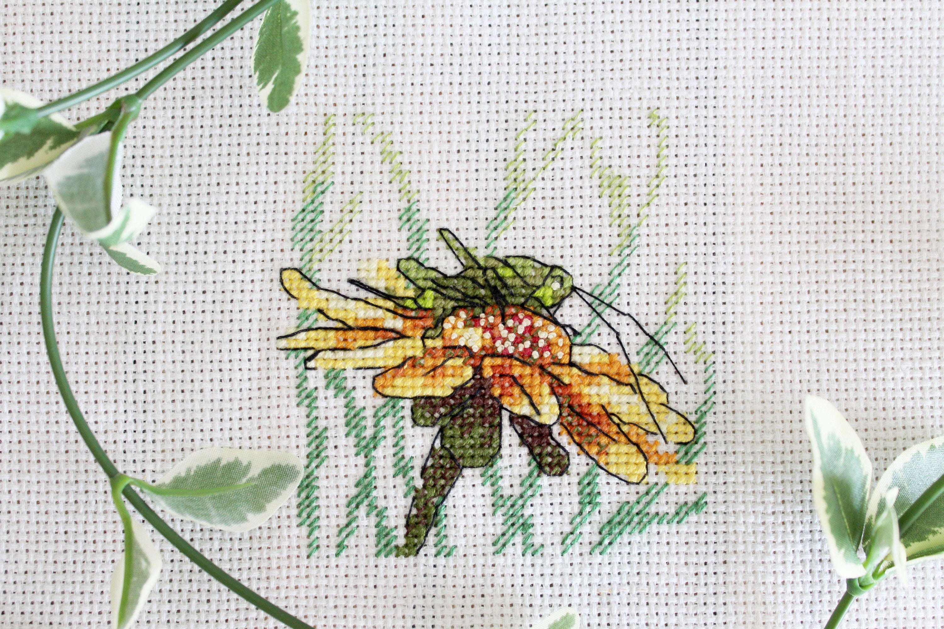 Grasshopper on Coneflower SM-622 Counted Cross Stitch Kit with Aida canvas, threads, and needle.