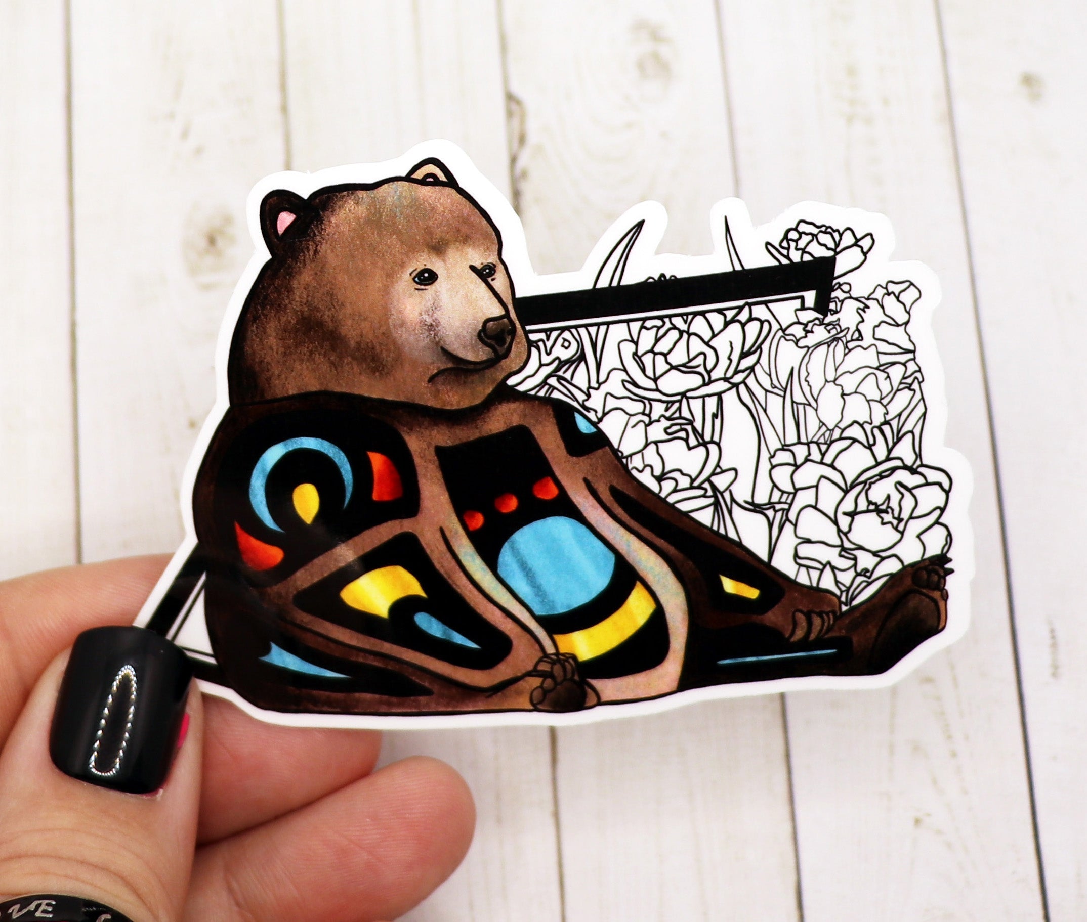 A vibrant Grizzly Sticker featuring a bear design on high-quality matte vinyl, perfect for personalizing various items.