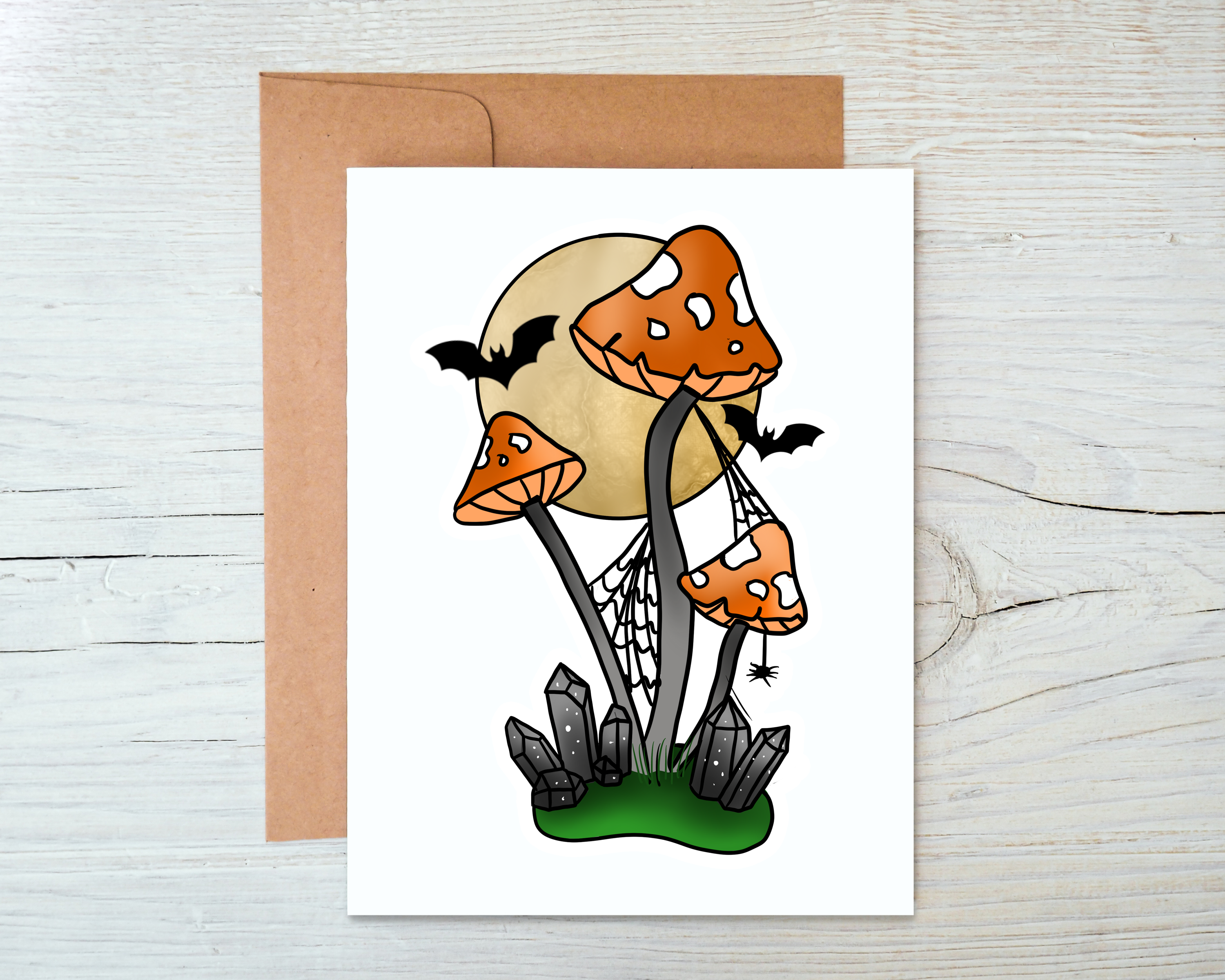 A whimsical Halloween mushroom card with a blank interior and a kraft envelope, perfect for personal messages.