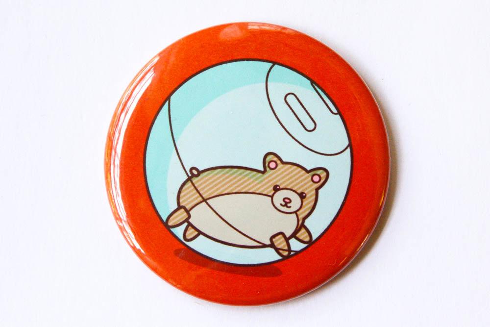 Hamster Magnet or Pin featuring a cute hamster in a ball, available in multiple formats.