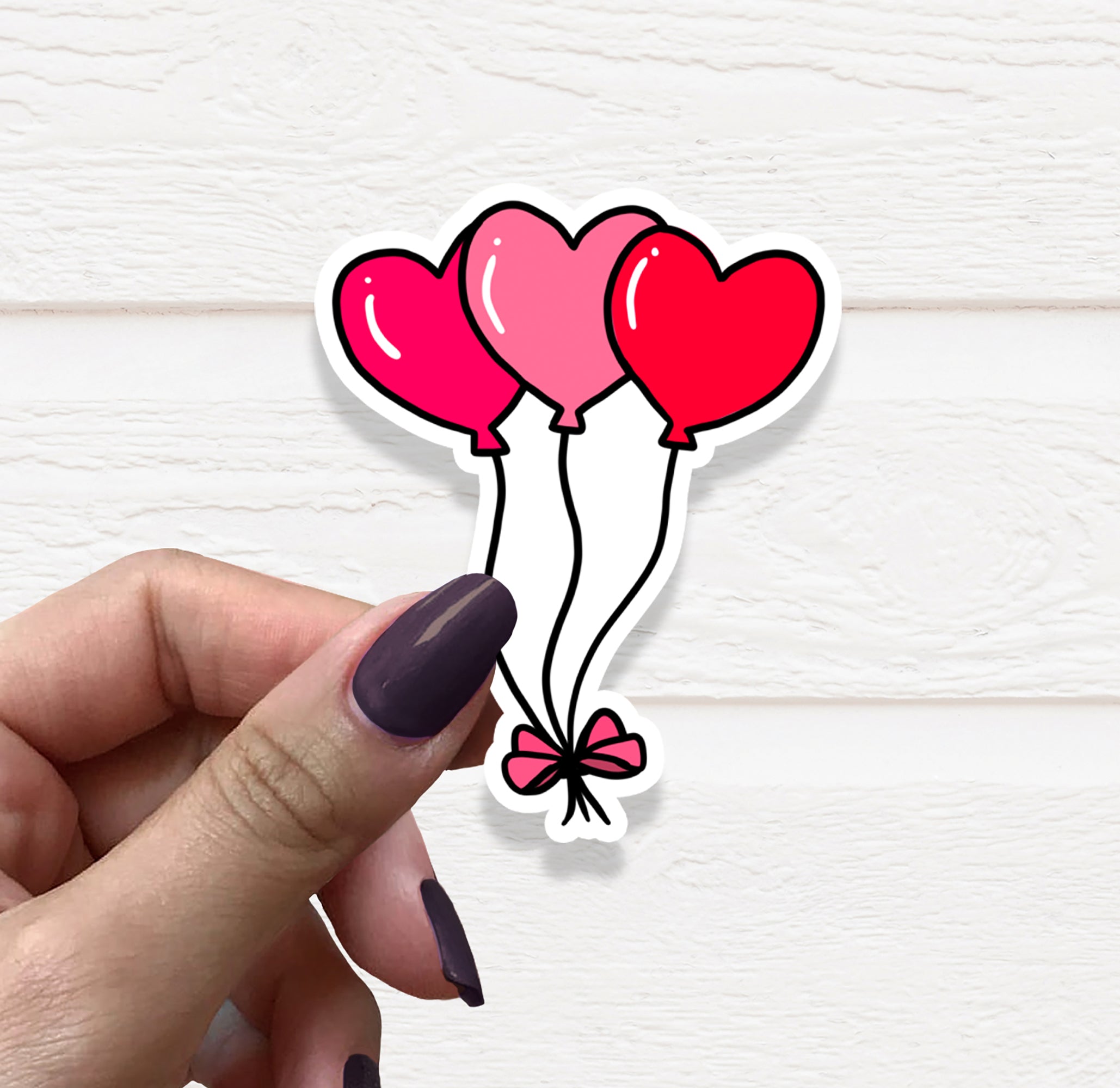 A colorful Heart Balloons Vinyl Sticker featuring whimsical balloon designs, perfect for personalizing various items.