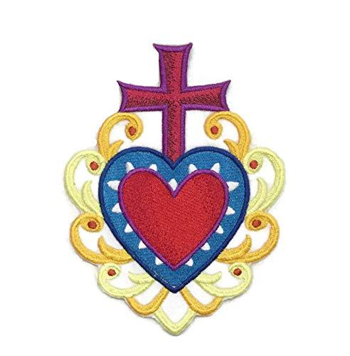 Heart and Cross Milagro embroidered patch on a white background, showcasing intricate embroidery and vibrant colors.