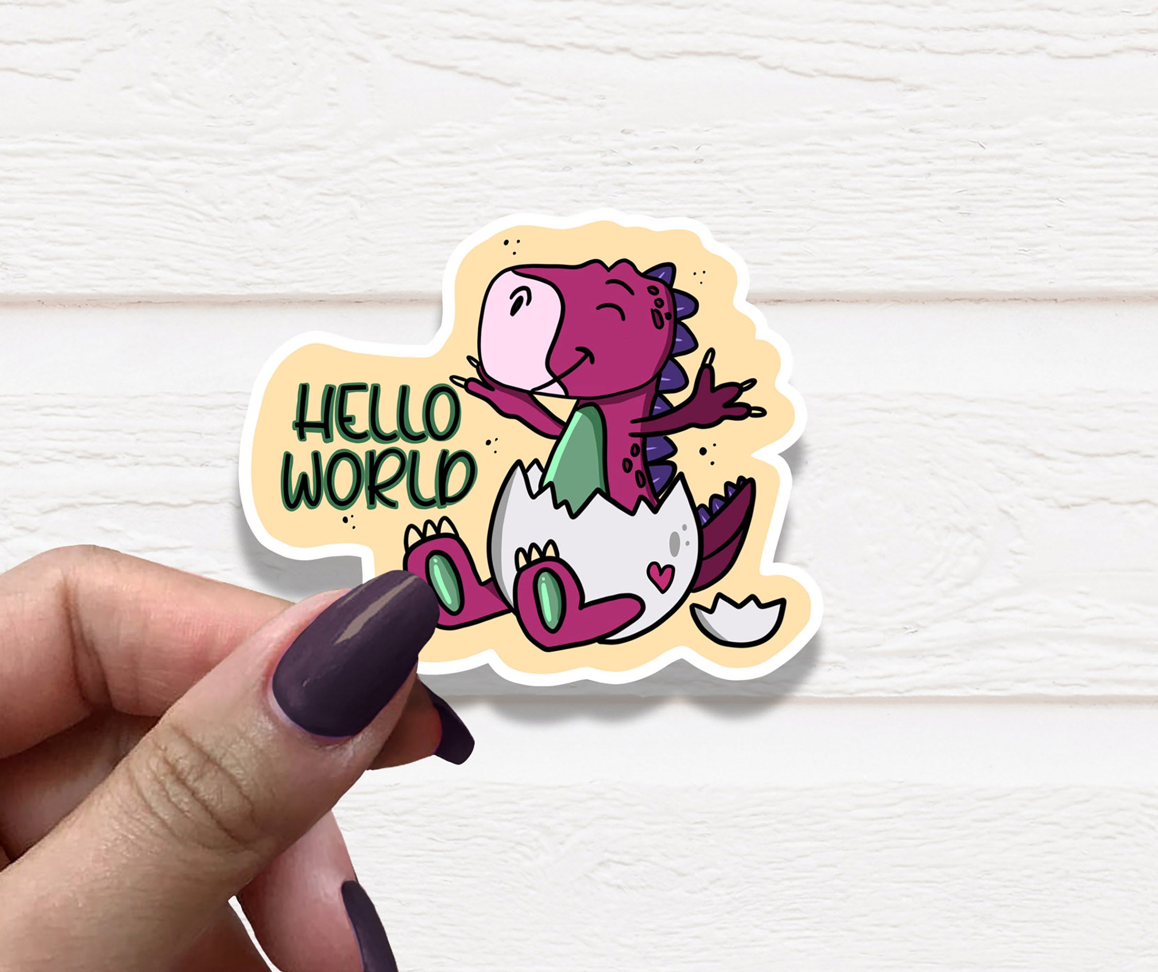 Hello World Vinyl Sticker on a white background, showcasing its vibrant colors and matte finish.