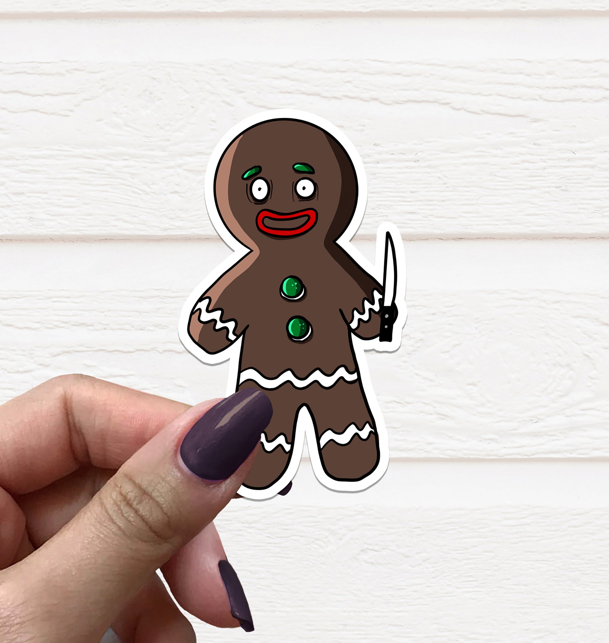 Horror Gingerbread Man Vinyl Sticker featuring a spooky design with a festive touch, perfect for holiday decorations.