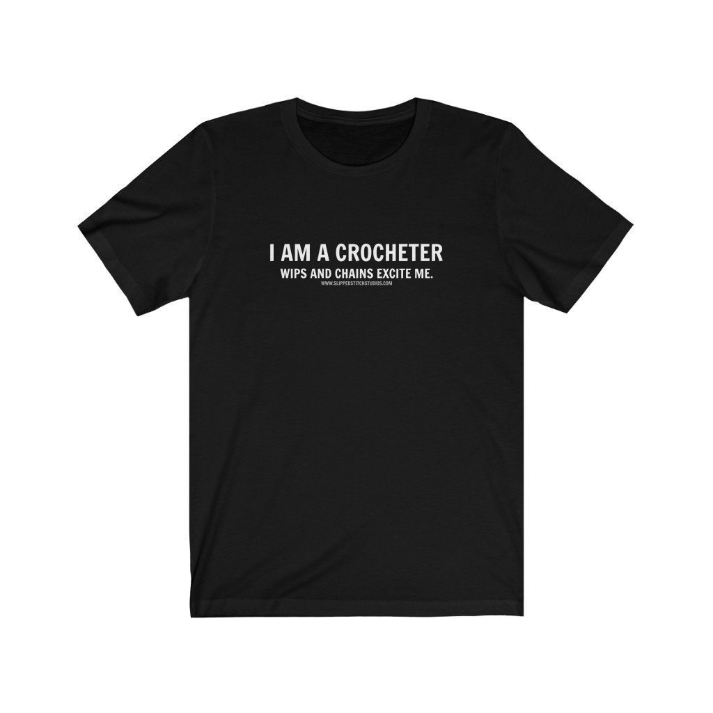 Black unisex jersey short sleeve tee featuring the I AM A CROCHETER meme design, showcasing a fun and stylish look for crochet enthusiasts.