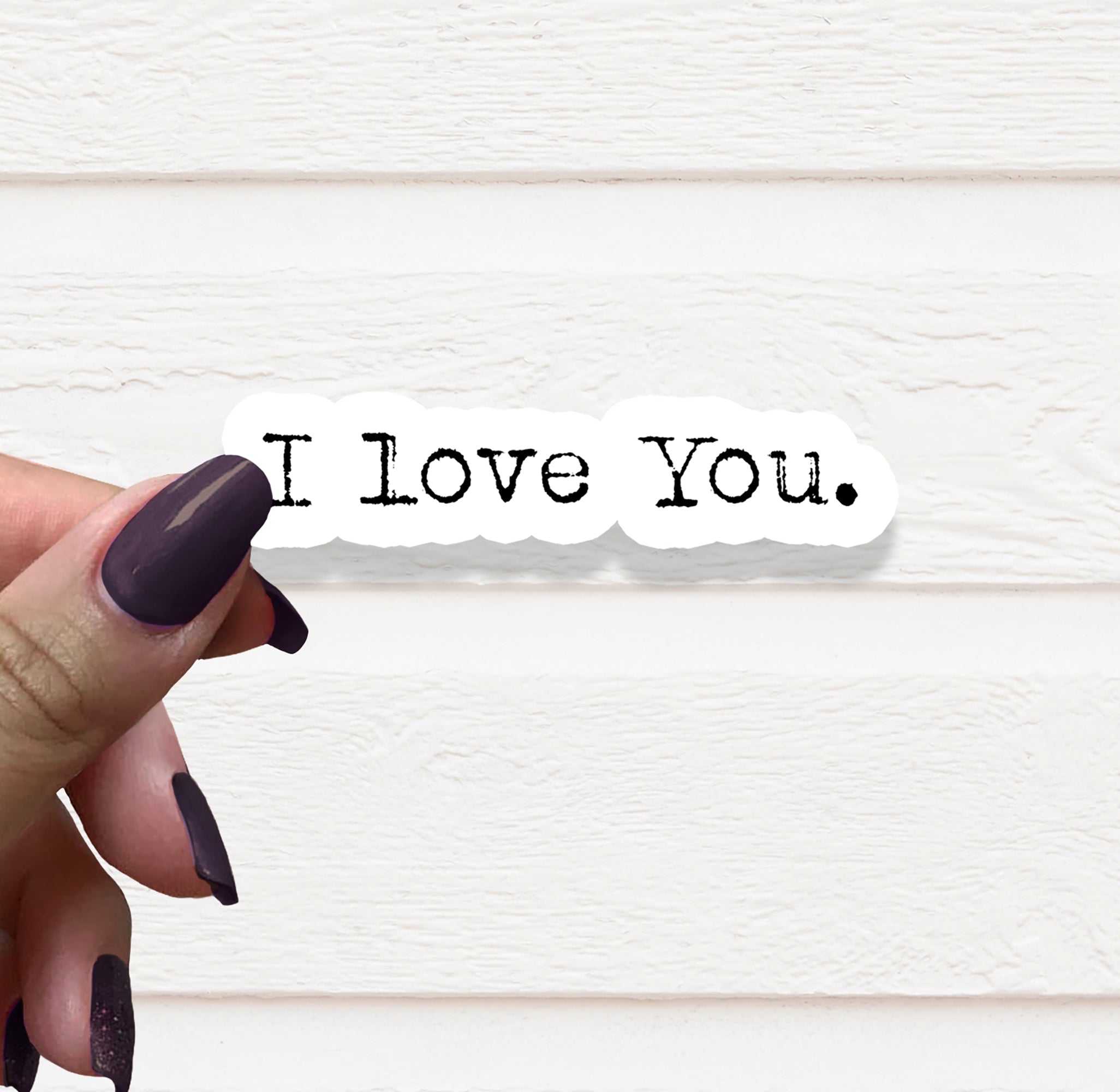 A vibrant I Love You vinyl sticker on a white background, showcasing its matte finish and clear lettering.