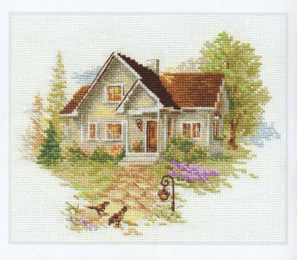 July House 3-20 Counted Cross-Stitch Kit featuring white Aida fabric, colorful threads, and an embroidery needle.