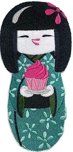 Kokeshi and Cupcake embroidery iron-on patch featuring vibrant colors and intricate details, measuring 6.84" x 3.34".