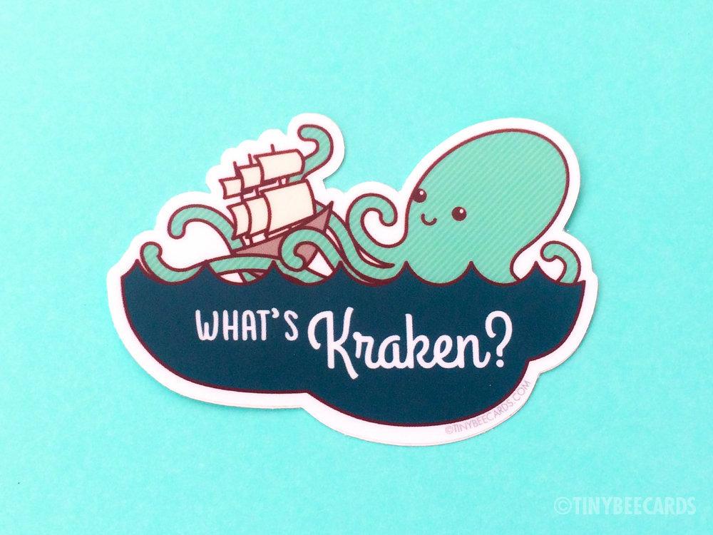 A cute vinyl sticker featuring a kraken and a ship with the pun 'What's Kraken?' in vibrant colors.