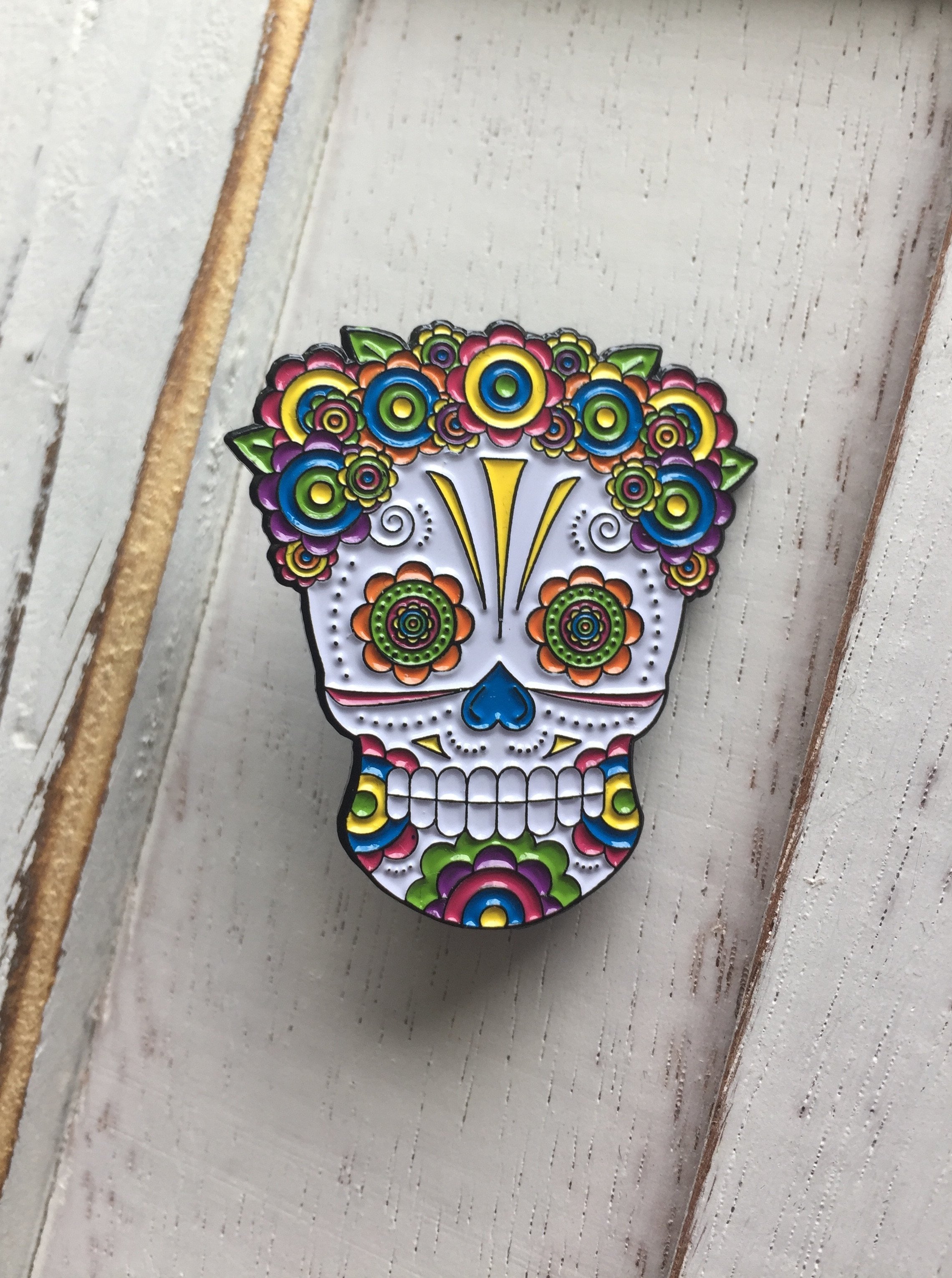 Lady Sugar Skull Soft Enamel Pin featuring vibrant colors and floral headpiece, measuring 1.50 inches.