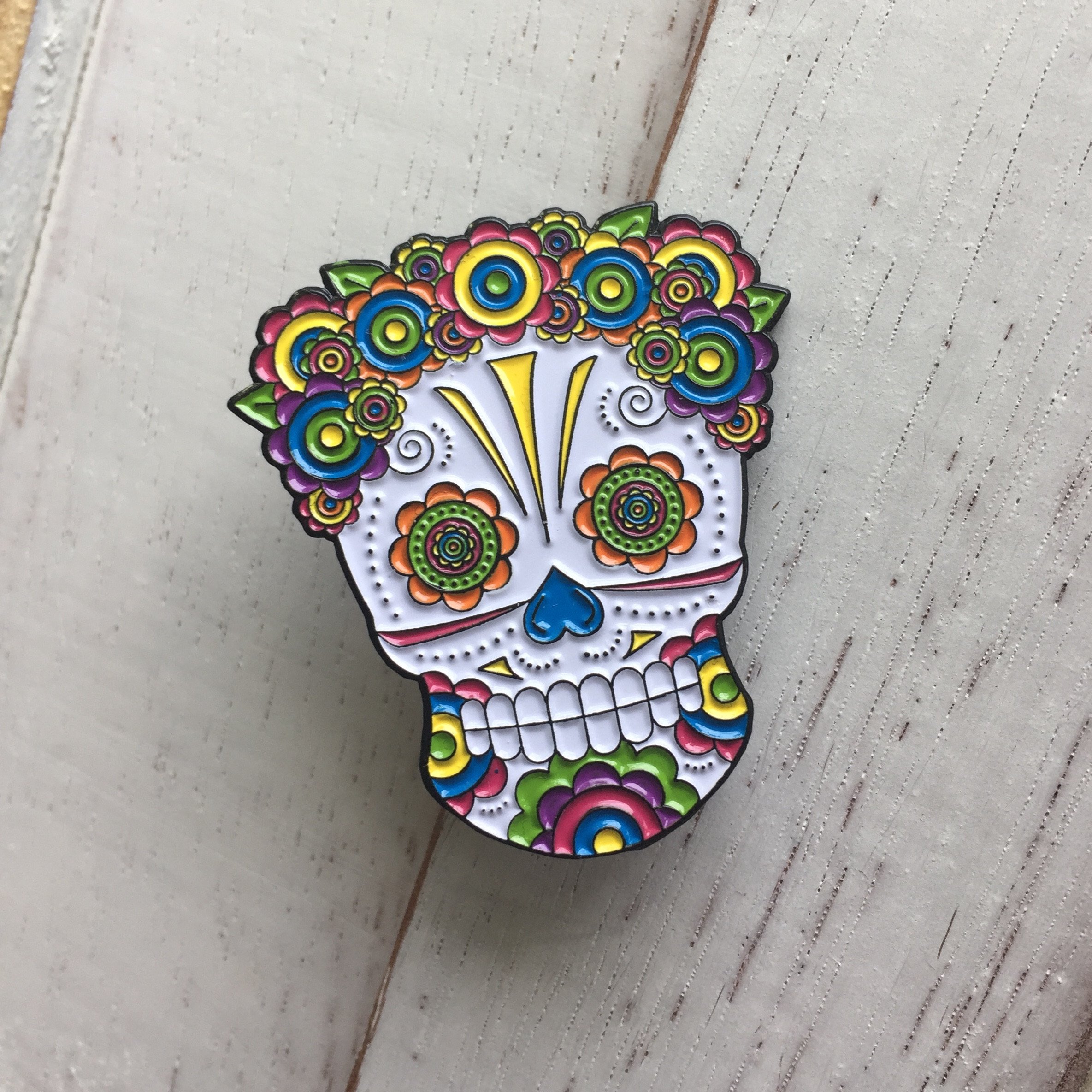 Lady Sugar Skull Soft Enamel Pin featuring vibrant colors and floral headpiece, measuring 1.50 inches.