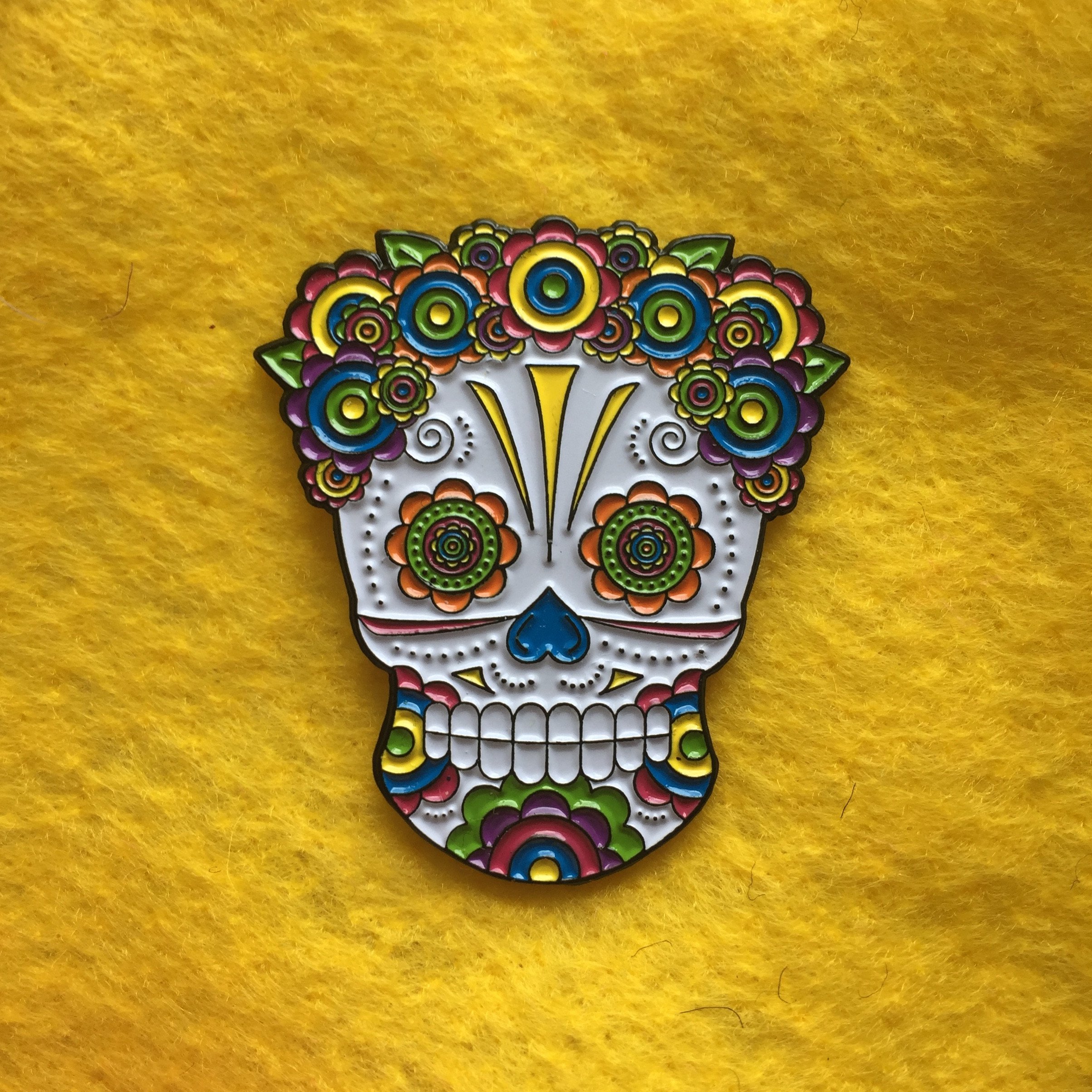 Lady Sugar Skull Soft Enamel Pin featuring vibrant colors and floral headpiece, measuring 1.50 inches.