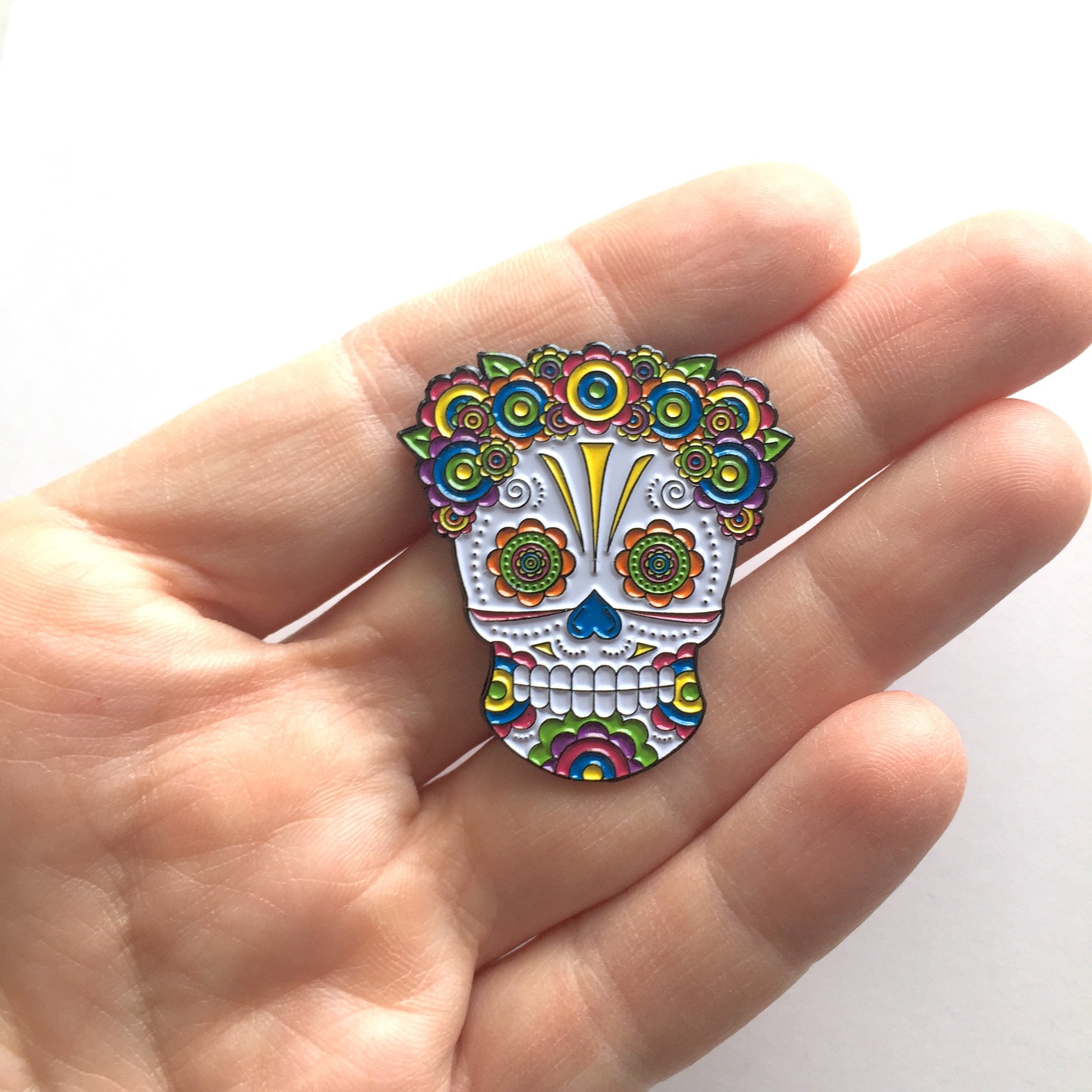 Lady Sugar Skull Soft Enamel Pin featuring vibrant colors and floral headpiece, measuring 1.50 inches.