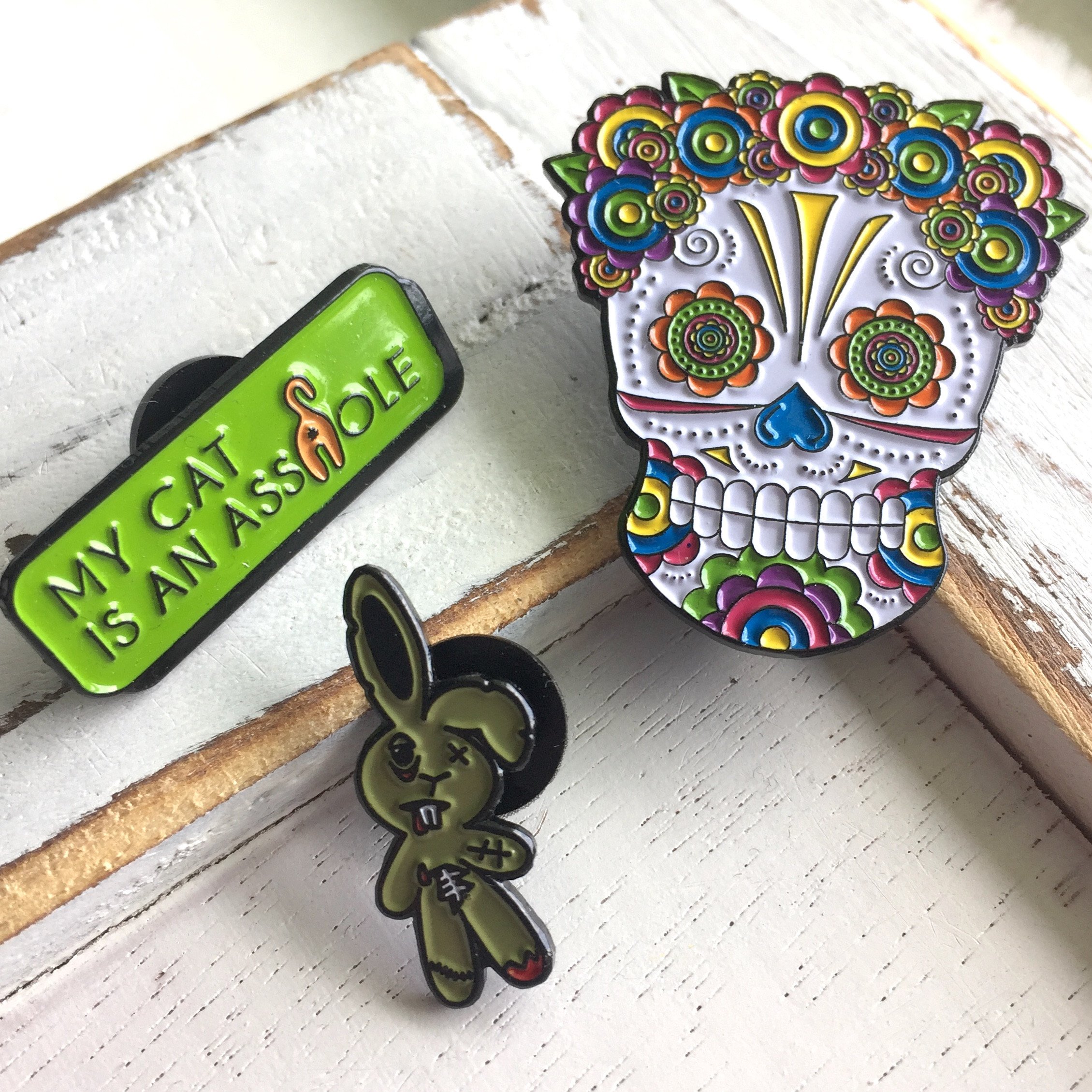 Lady Sugar Skull Soft Enamel Pin featuring vibrant colors and floral headpiece, measuring 1.50 inches.