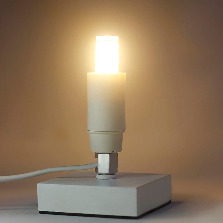 A stylish lamp accessory featuring a lamp base, LED bulb, and chord with switch, designed for dual-use models.