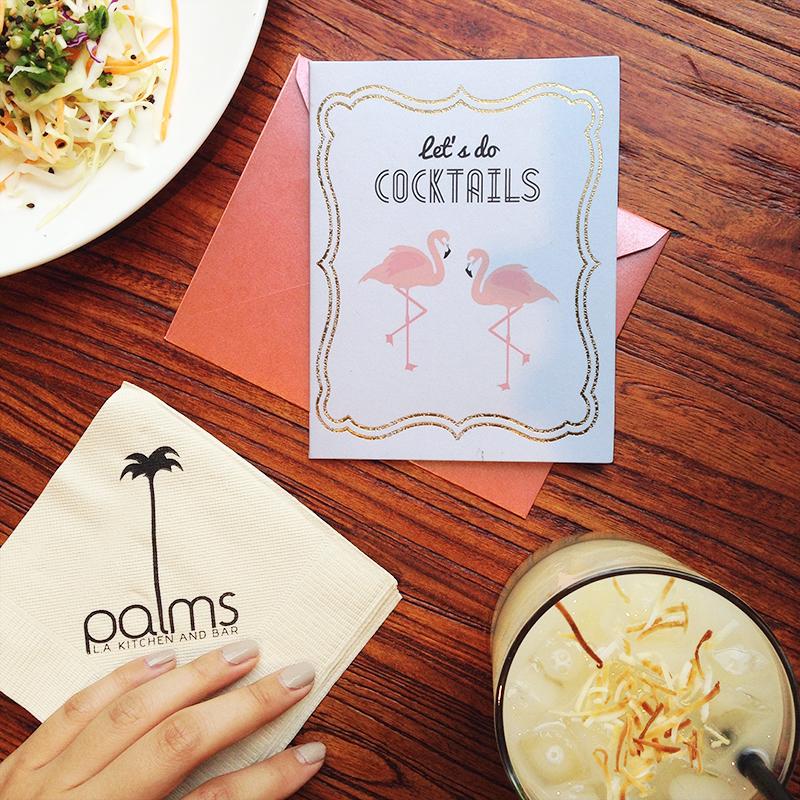 Stylish 'Let's Do Cocktails' invitation card with gold foil accents and lined envelope, perfect for celebrations.