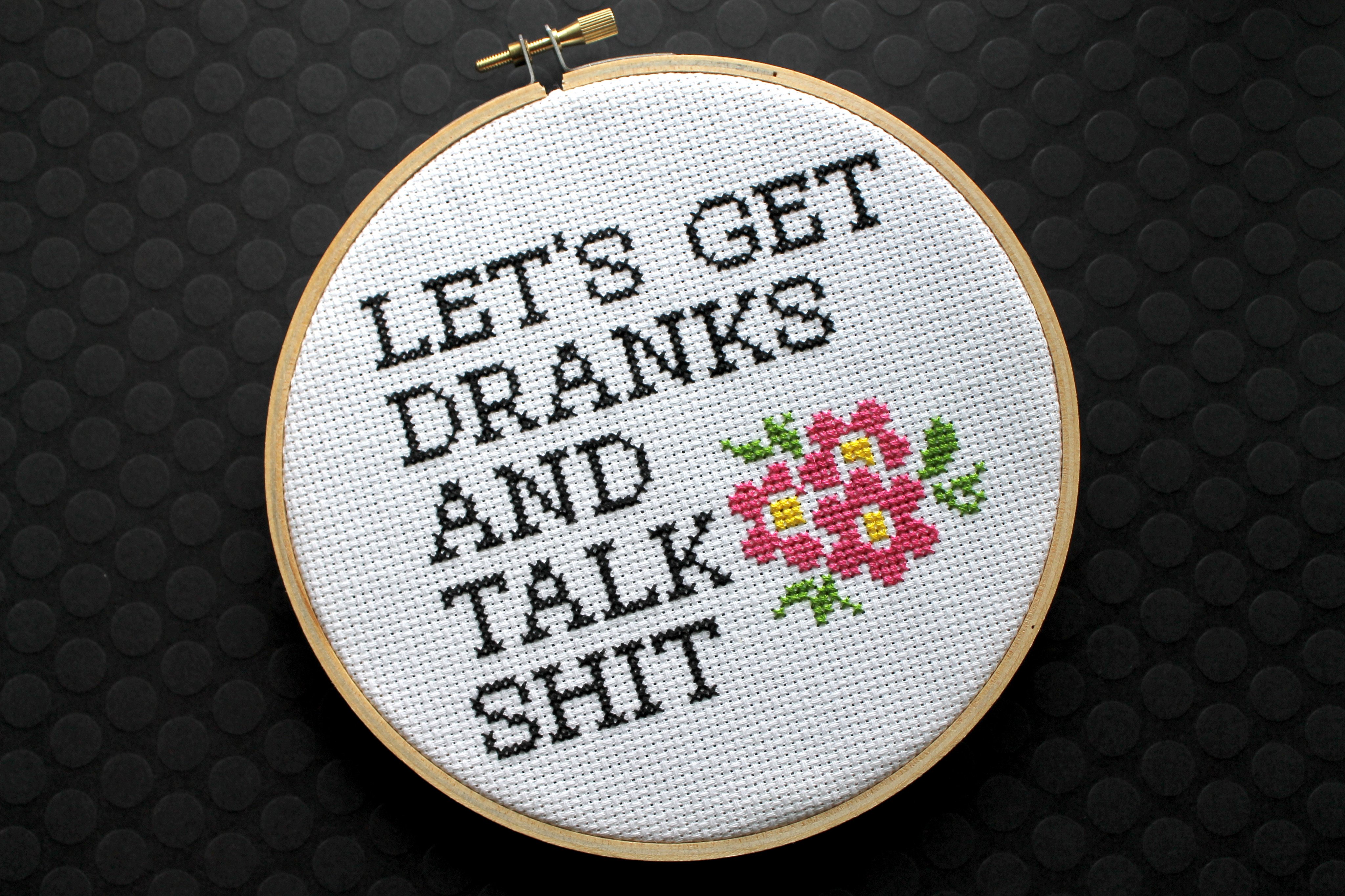 Let's Get Dranks and Talk Sh*t Counted Cross Stitch DIY Kit featuring floral elements and humorous text.