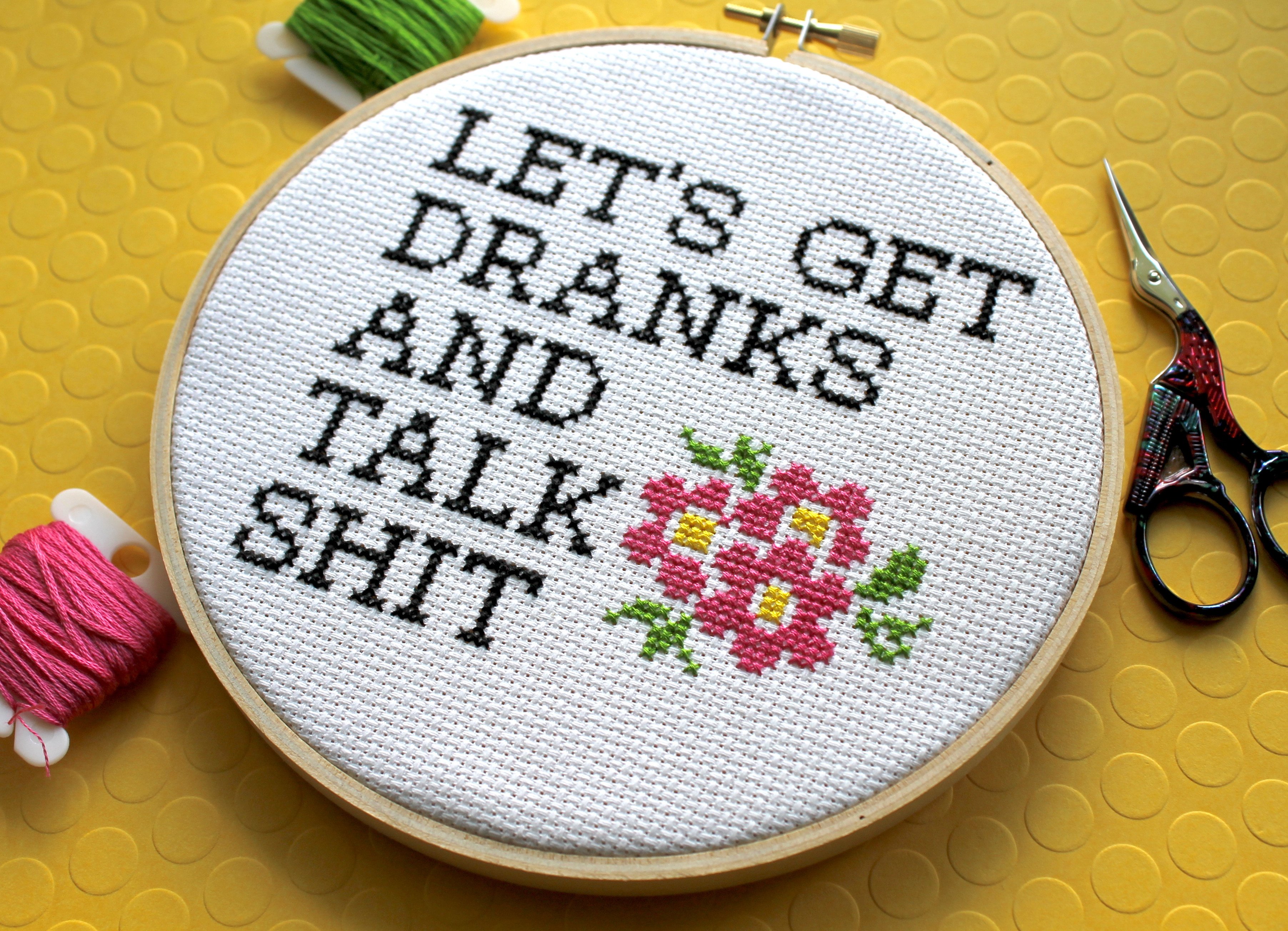 Let's Get Dranks and Talk Sh*t Counted Cross Stitch DIY Kit featuring floral elements and humorous text.