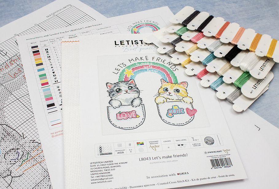 Let's Make Friends! L8043 Counted Cross Stitch Kit featuring colorful threads, canvas, and instruction chart.