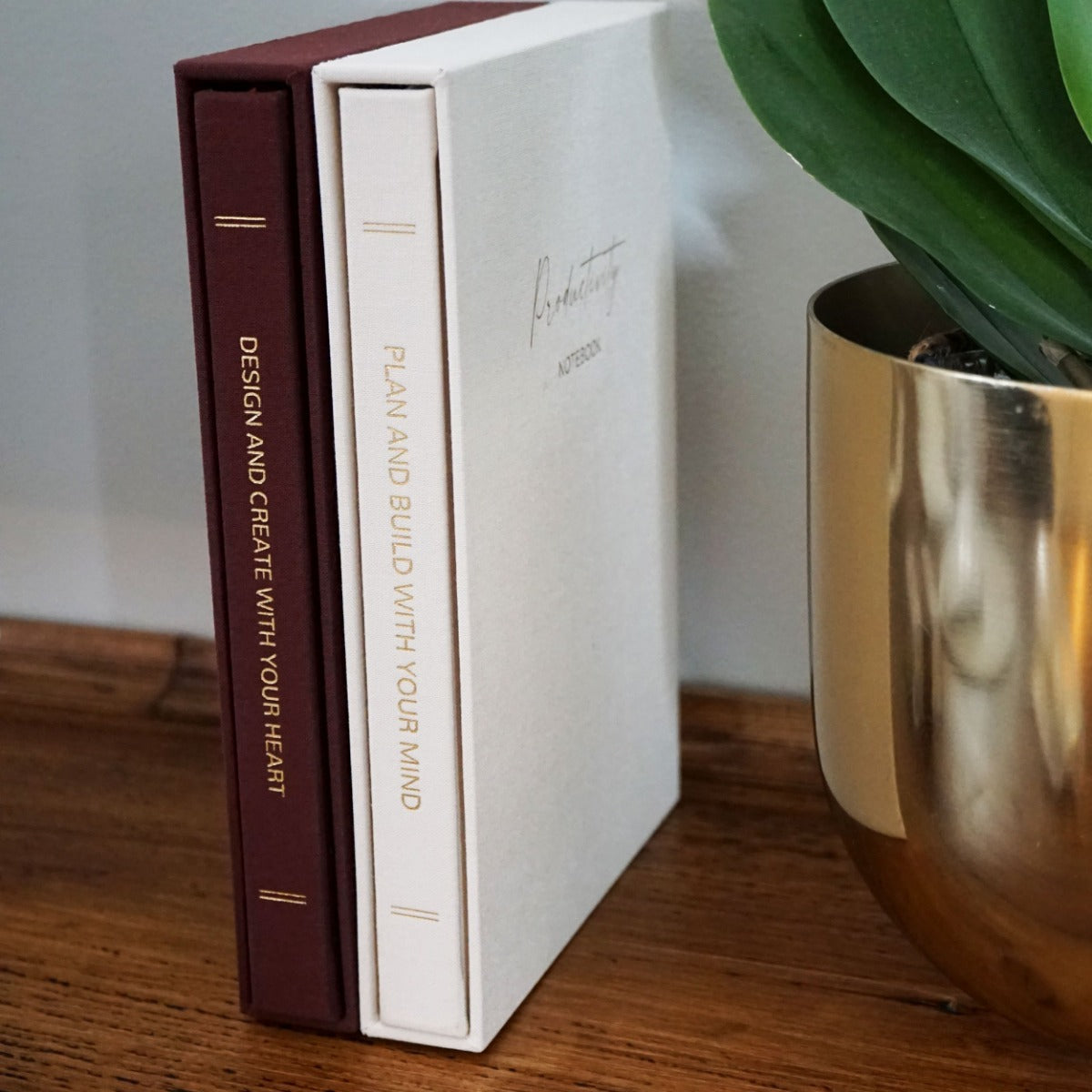 Linen Productivity Lined Notebook with gold edging and silk ribbon bookmark, displayed in a protective hardback sleeve.