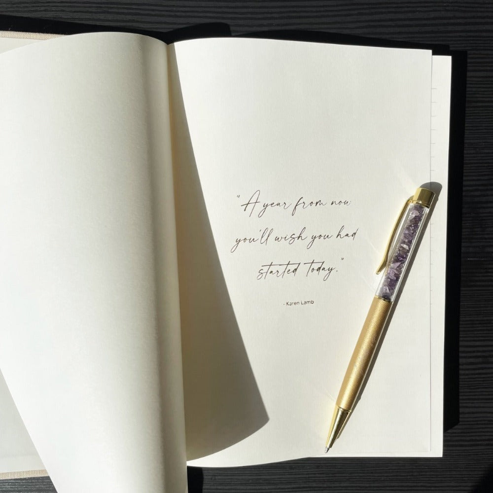 Linen Productivity Lined Notebook with gold edging and silk ribbon bookmark, displayed in a protective hardback sleeve.