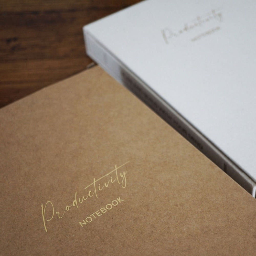 Linen Productivity Lined Notebook with gold edging and silk ribbon bookmark, displayed in a protective hardback sleeve.