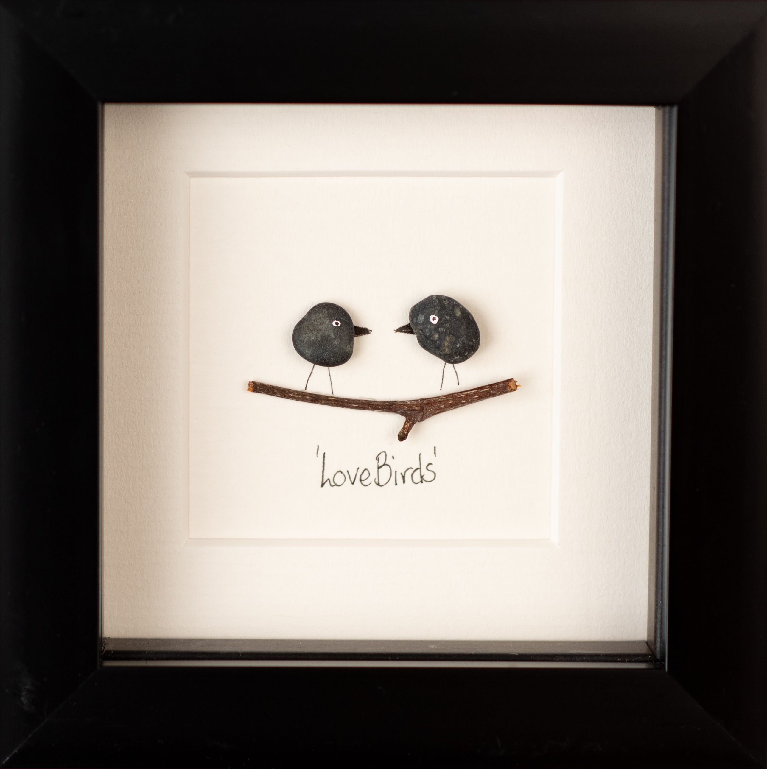 A beautifully framed Love Birds artwork featuring two birds in a natural setting, symbolizing love and connection.