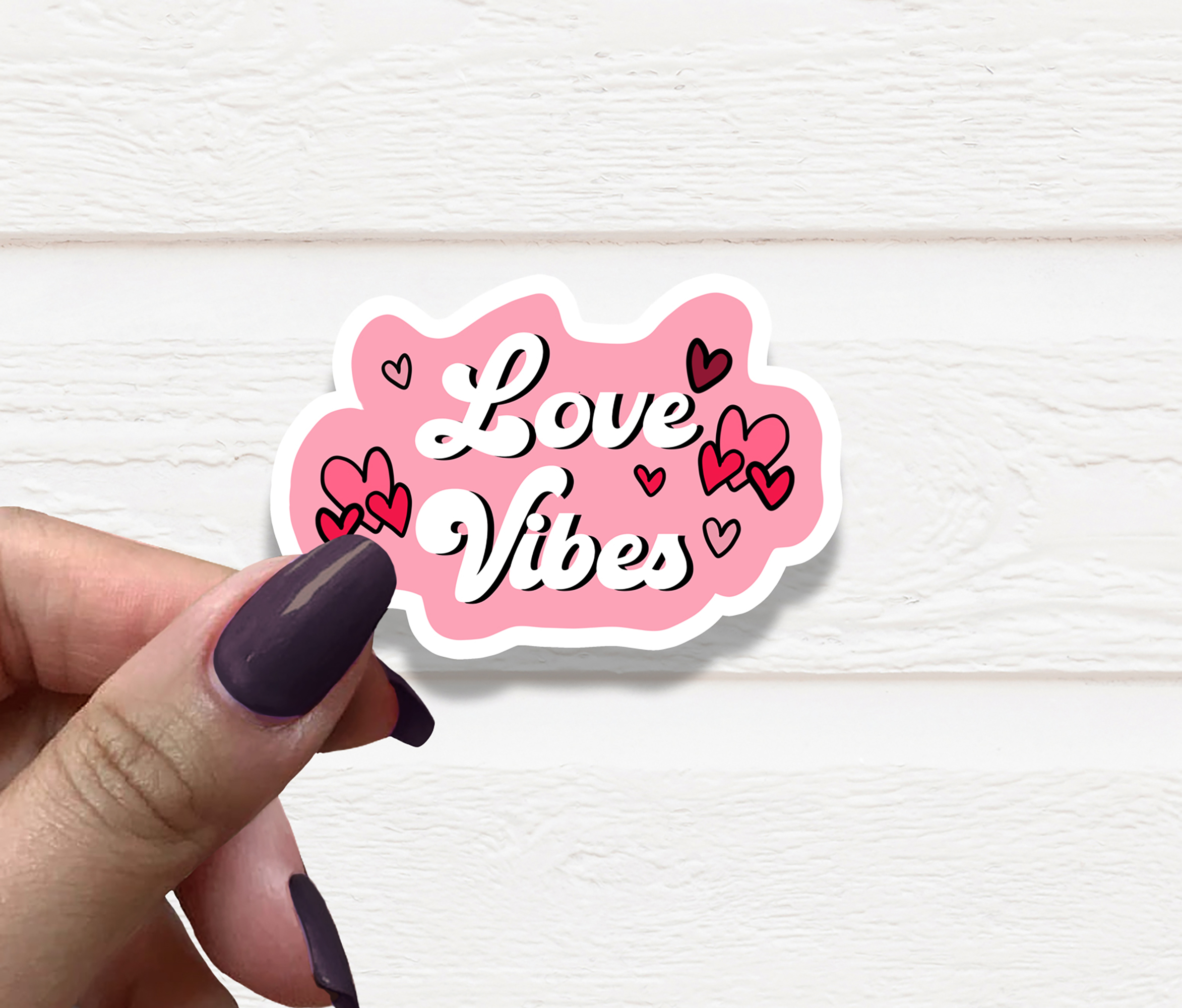 Love Vibes Vinyl Sticker featuring a vibrant design on matte vinyl, perfect for personalizing various items.