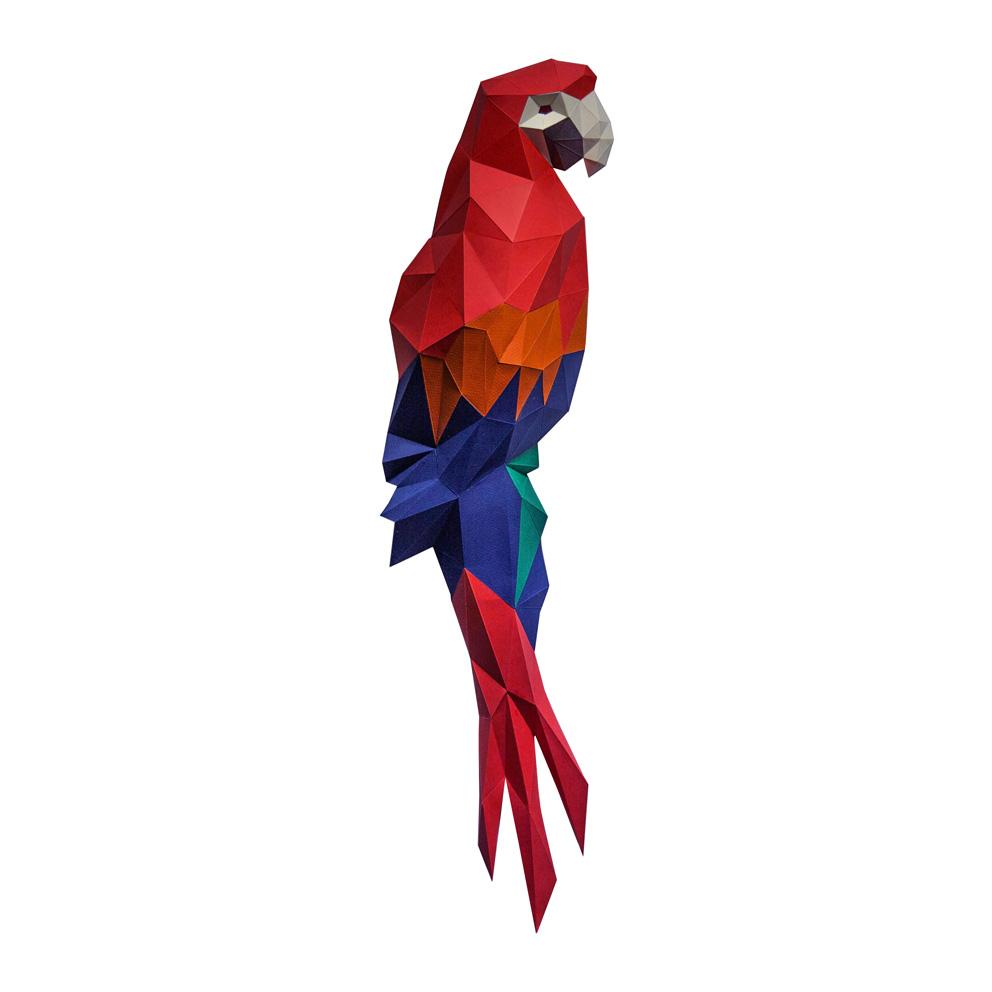 Colorful 3D Macaw Wall Art made from paper, showcasing vibrant feathers and a large beak, mounted as if perched on a branch.