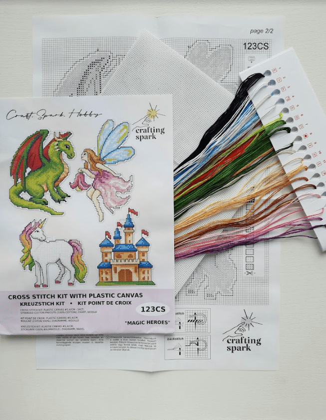 Magic Heroes 123CS Counted Cross-Stitch Kit with vibrant colors and plastic canvas, perfect for crafting.