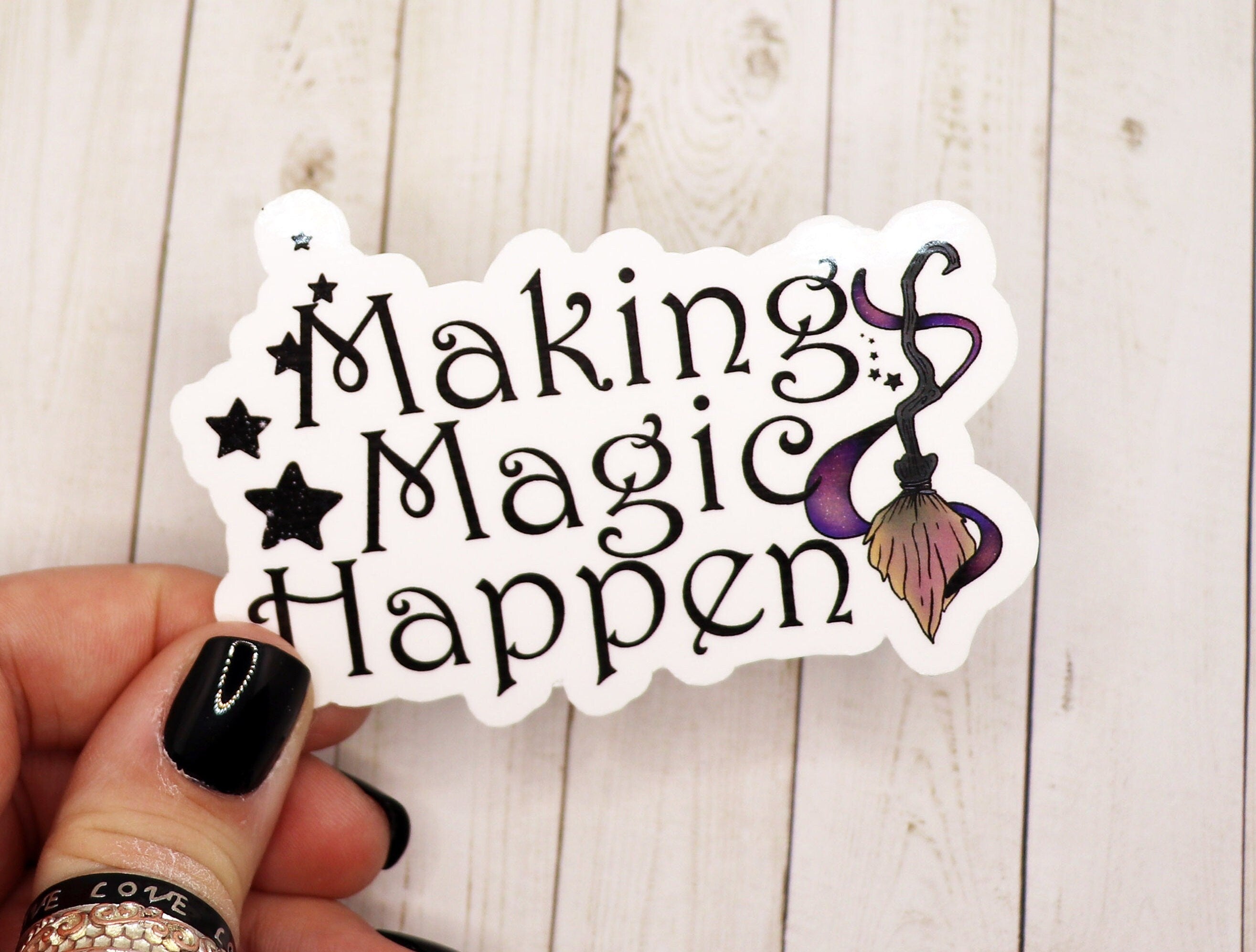 A vibrant Making Magic Happen vinyl sticker featuring whimsical design, perfect for personalizing various items.