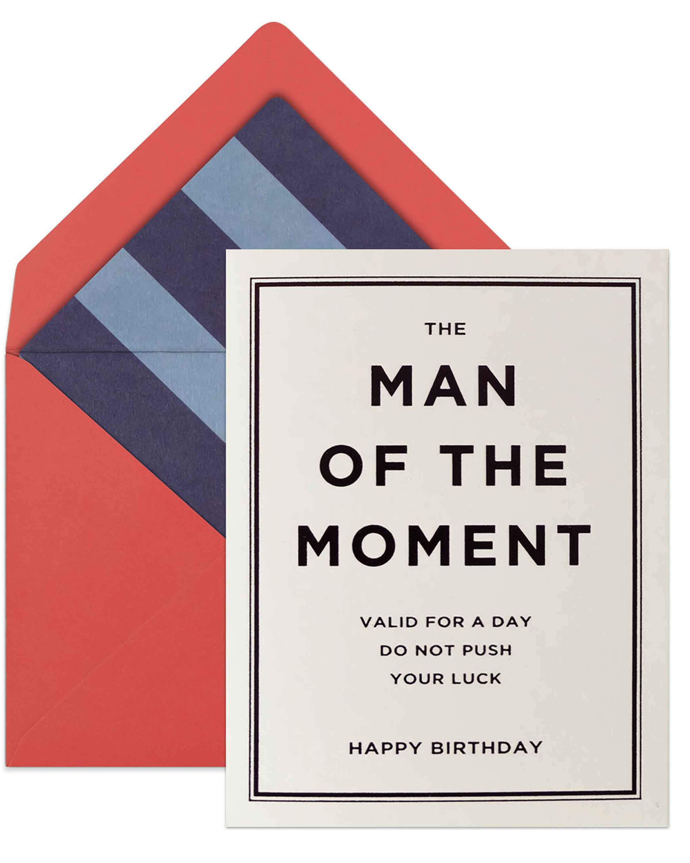 Man Of The Moment birthday card with black foil accents and lined envelope, folded with blank interior.