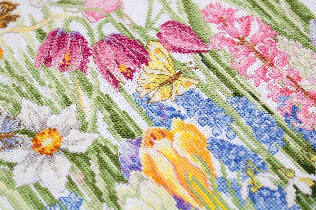 March Bouquet B2388L Counted Cross-Stitch Kit featuring Aida canvas, colorful threads, and needle for embroidery.