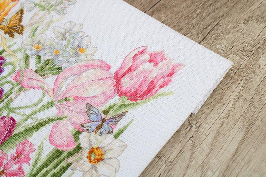 March Bouquet B2388L Counted Cross-Stitch Kit featuring Aida canvas, colorful threads, and needle for embroidery.