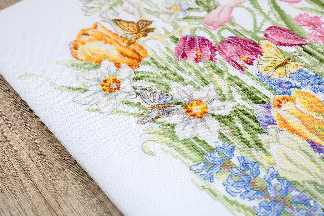 March Bouquet B2388L Counted Cross-Stitch Kit featuring Aida canvas, colorful threads, and needle for embroidery.