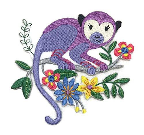 Maurice the Monkey embroidered patch, featuring vibrant colors and intricate design, perfect for iron-on or sew-on application.