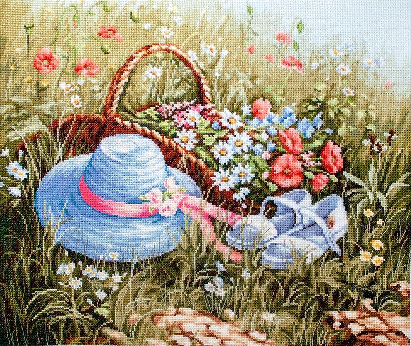 Meadow with Poppies BU4020L Counted Cross-Stitch Kit featuring vibrant flowers and blue hat on high-quality canvas.