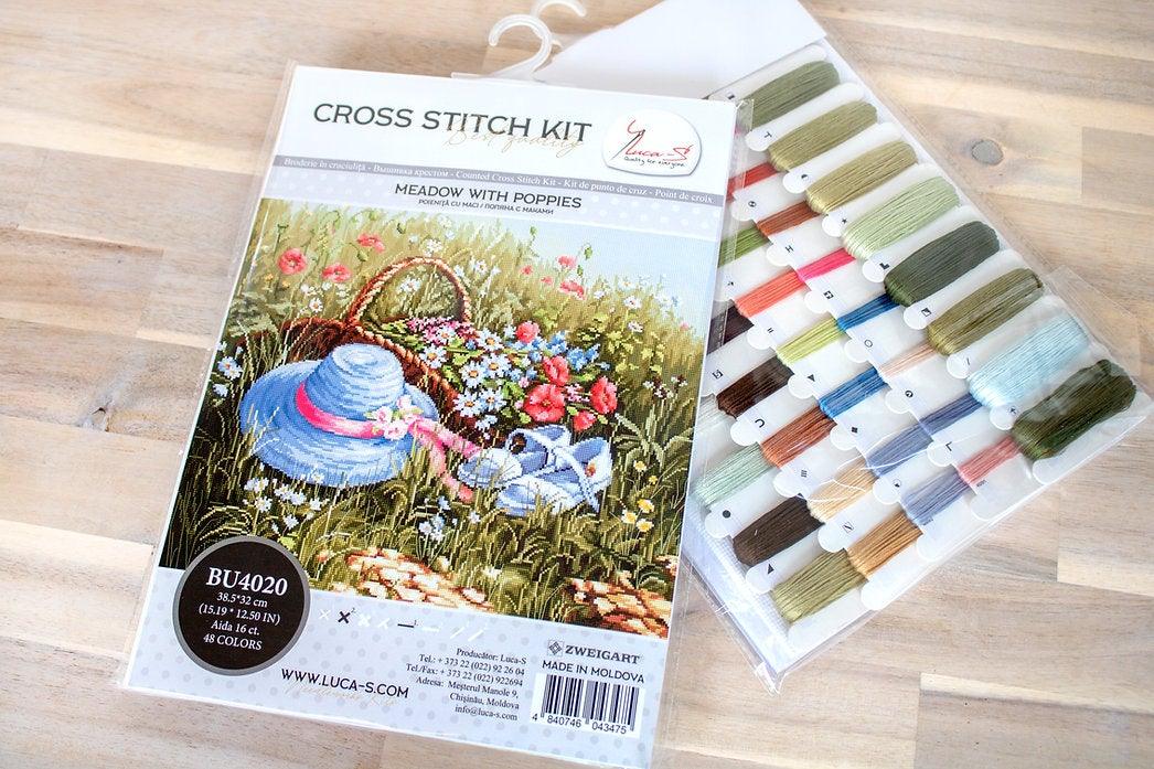 Meadow with Poppies BU4020L Counted Cross-Stitch Kit featuring vibrant flowers and blue hat on high-quality canvas.