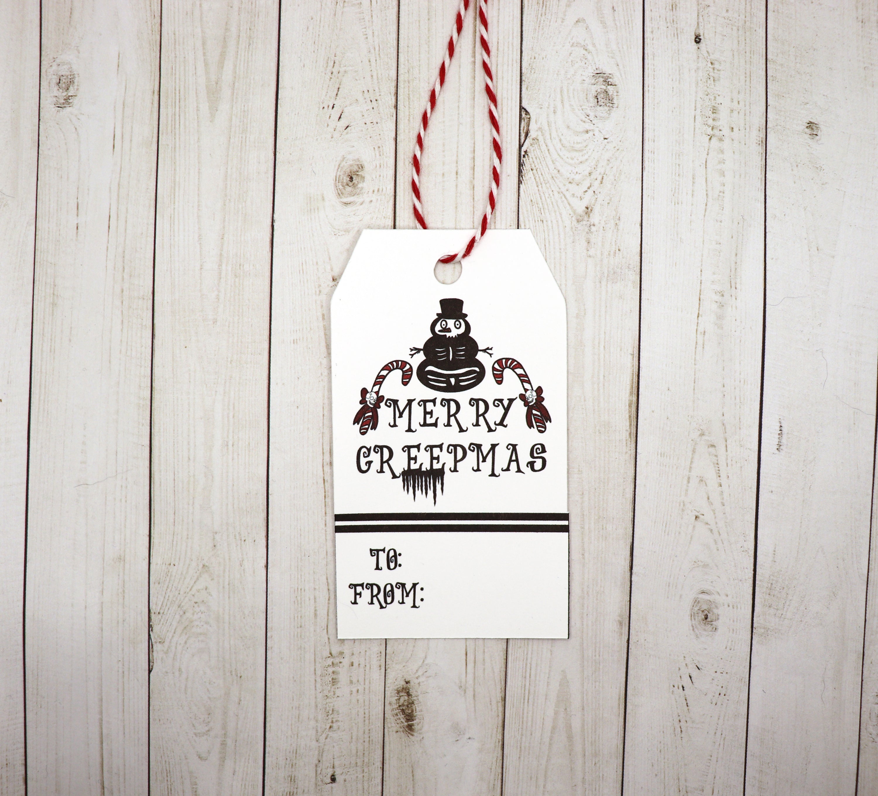 Merry Creepmas Gift Tag set featuring red and white twine, printed on heavy white cardstock, perfect for festive gift wrapping.