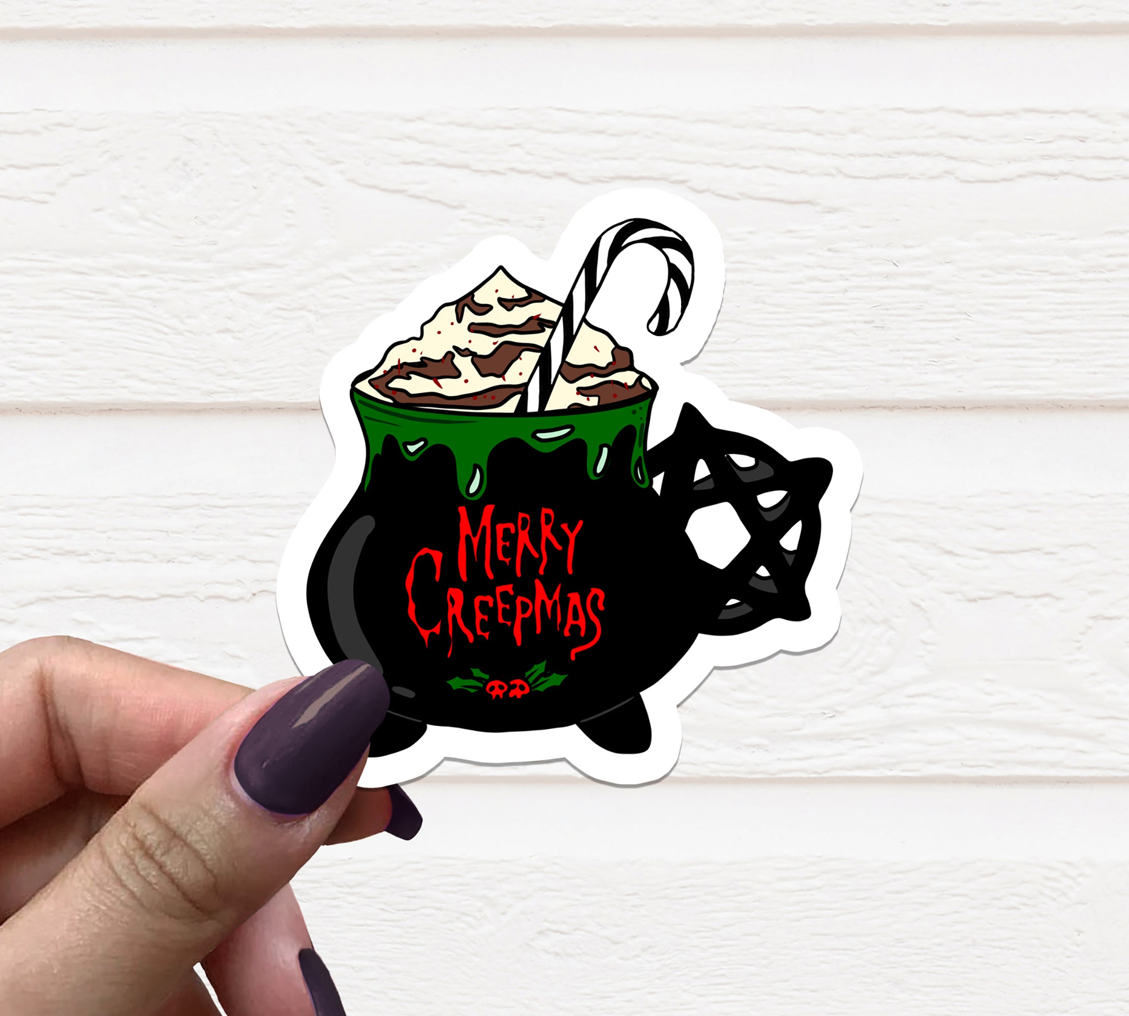 Merry Creepmas Mug Vinyl Sticker featuring a festive design, perfect for holiday decorations and personal items.