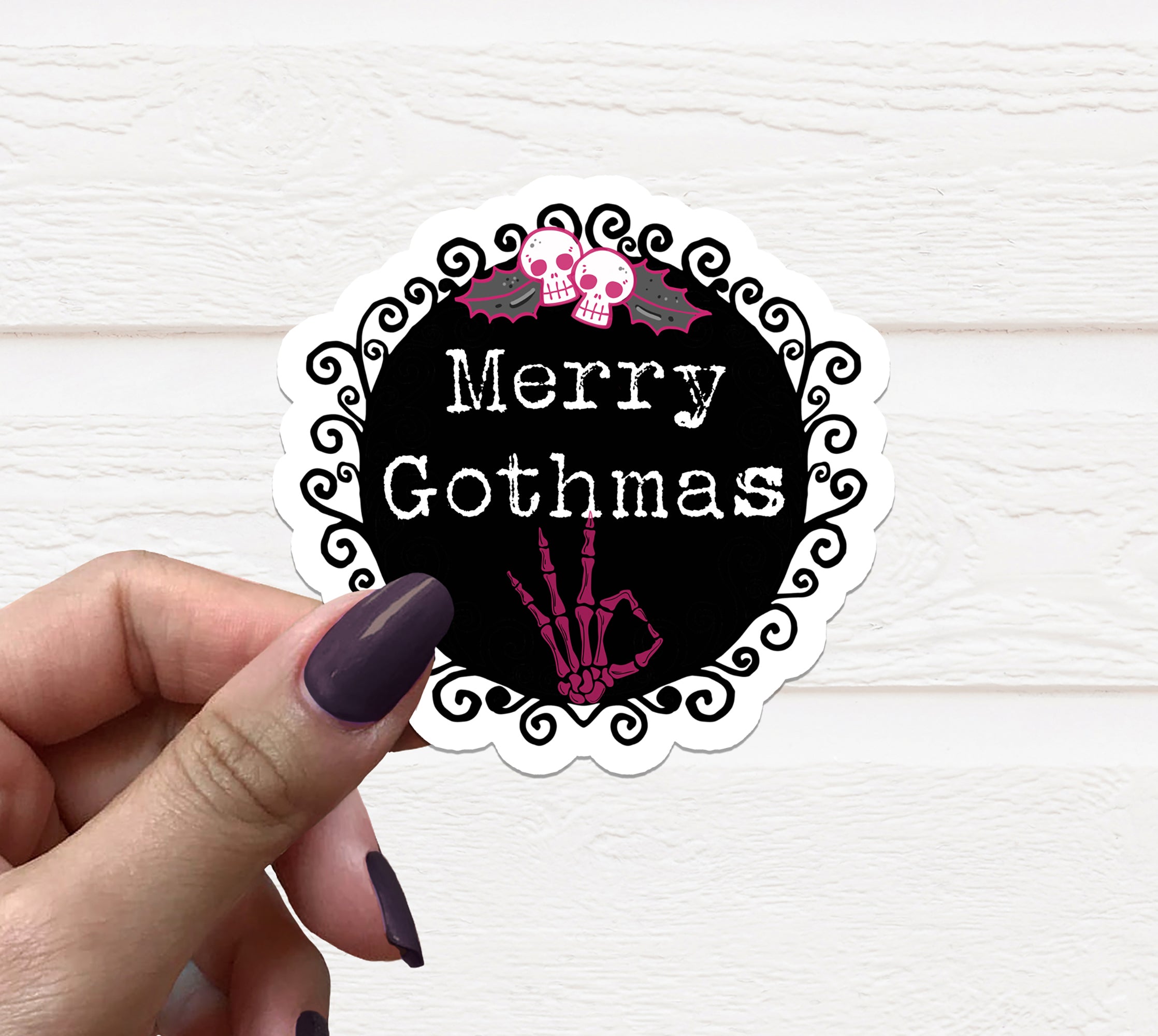 Merry Gothmas Vinyl Sticker featuring a unique Christmas design, perfect for personalizing items during the holiday season.