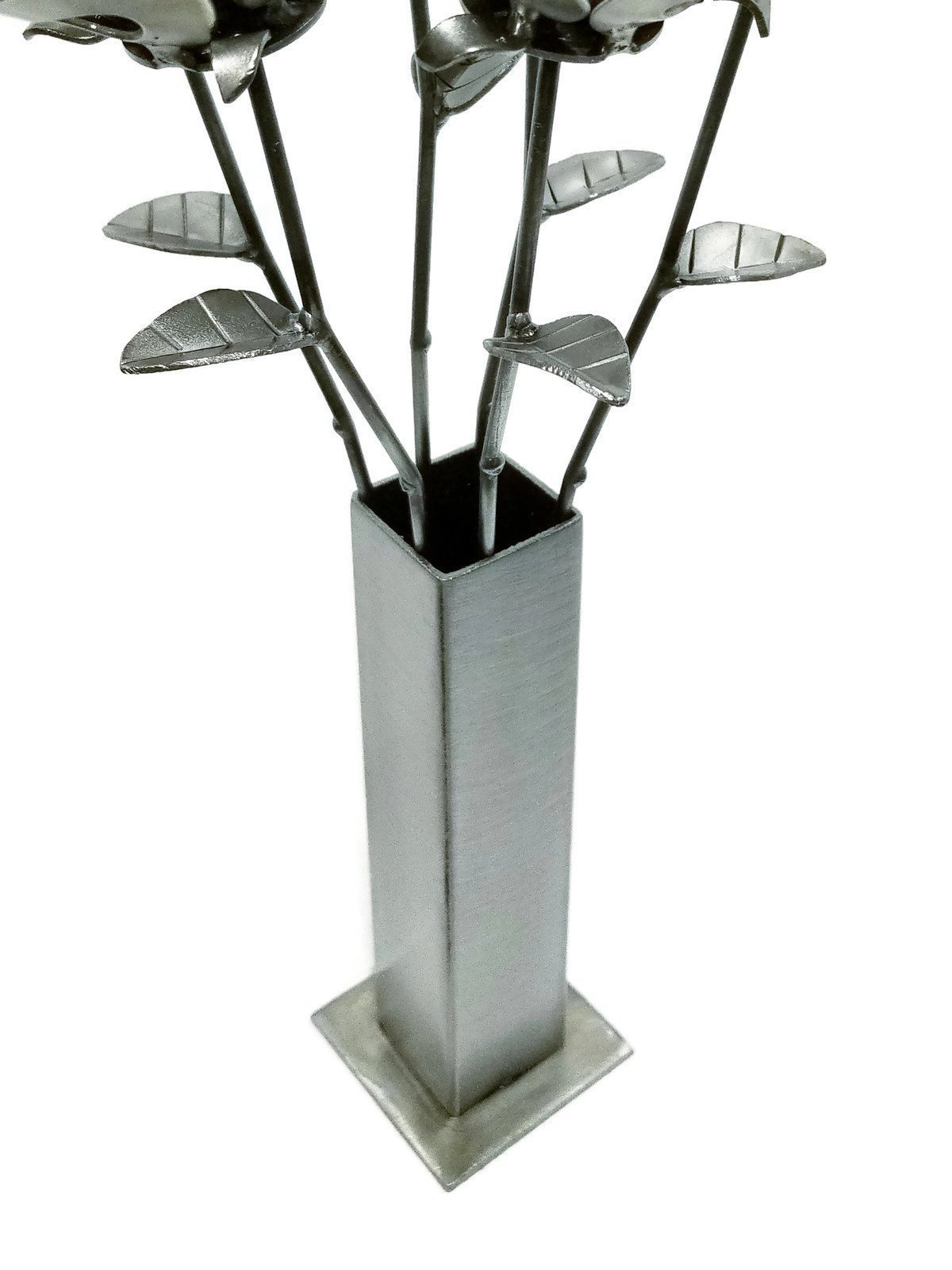 Handmade welded metal vase designed for forever roses, featuring a unique steampunk style and crafted from recycled materials.