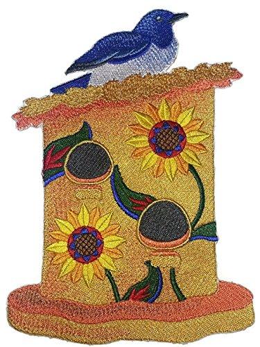 A colorful Mexican Birdhouse embroidered patch featuring a Mexican Blue Jay, showcasing intricate stitching and vibrant colors, perfect for garments.