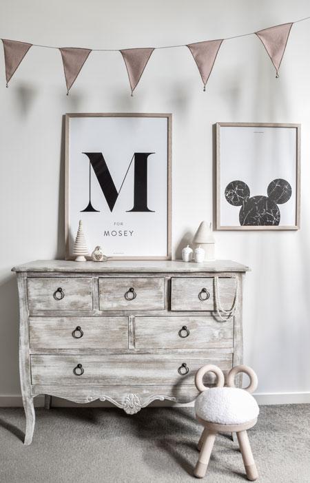 Rustic dresser with decorative items.