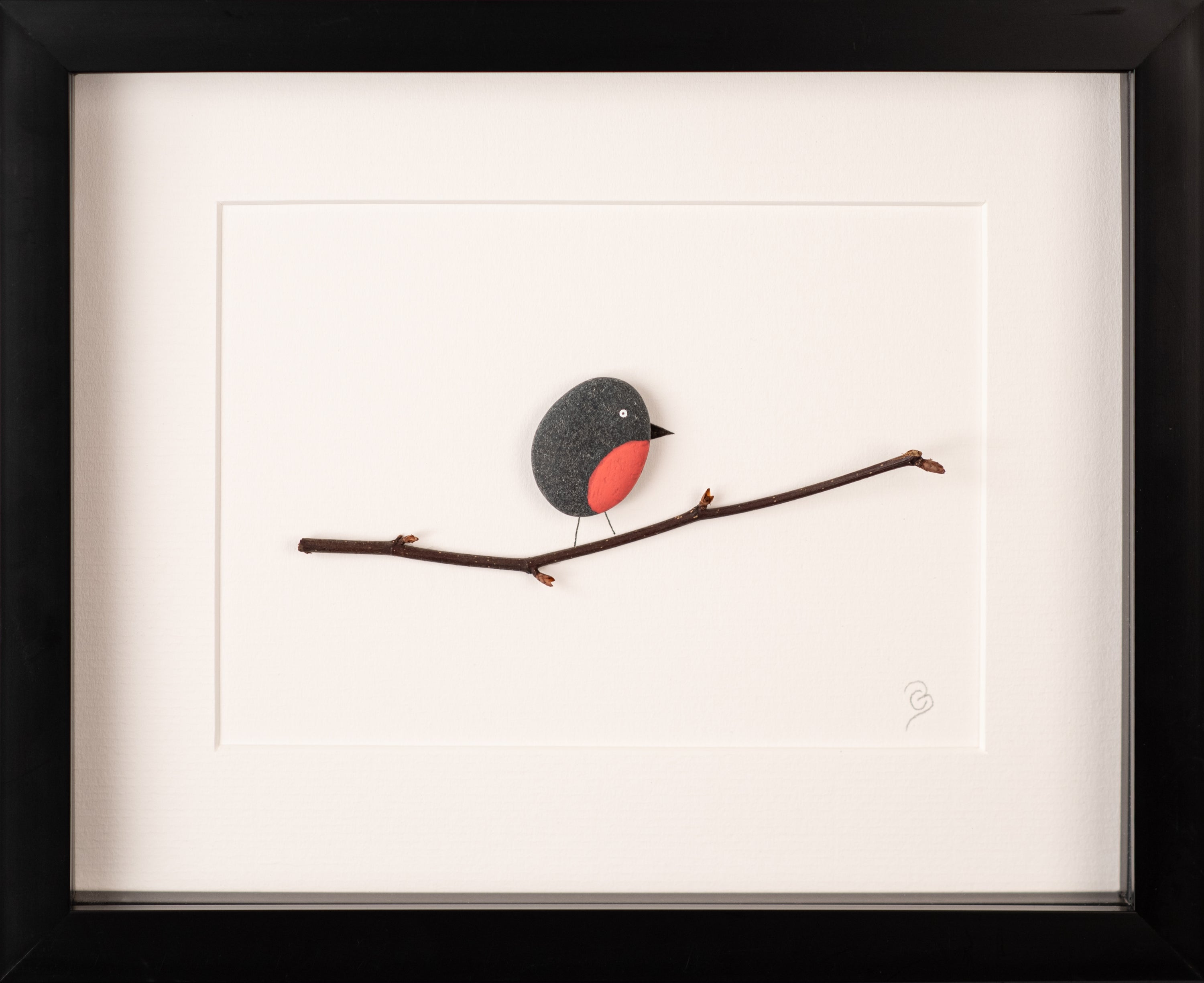 A beautifully crafted Mini Robin art piece framed in white, showcasing intricate details and natural materials, perfect for bird lovers.